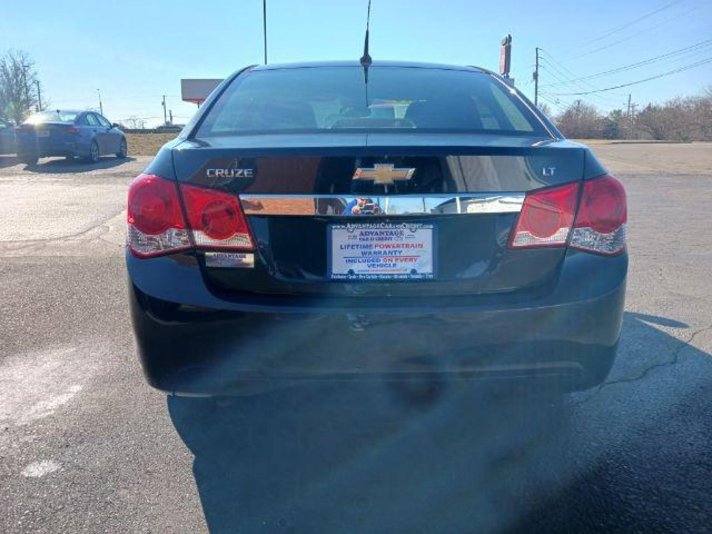 2014 Black Granite Metallic Chevrolet Cruze 1LT Auto (1G1PC5SB2E7) with an 1.4L L4 DOHC 16V TURBO engine, 6-Speed Automatic transmission, located at 880 E. National Road, Vandalia, OH, 45377, (937) 908-9800, 39.892189, -84.181015 - Photo#5