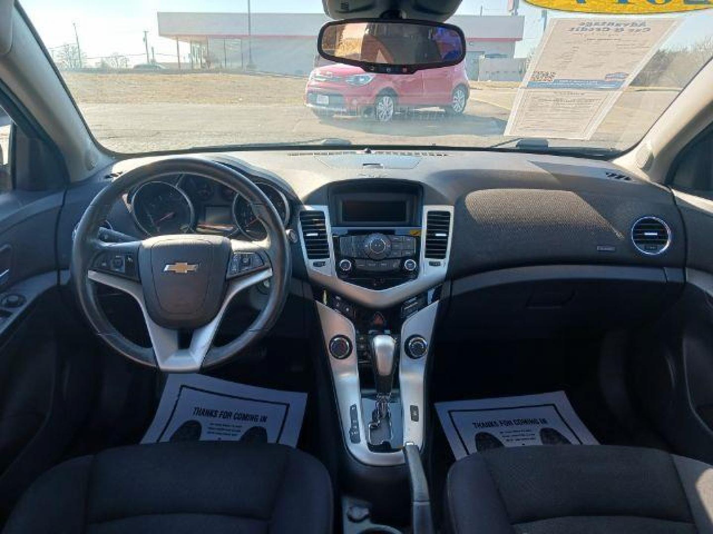 2014 Black Granite Metallic Chevrolet Cruze 1LT Auto (1G1PC5SB2E7) with an 1.4L L4 DOHC 16V TURBO engine, 6-Speed Automatic transmission, located at 880 E. National Road, Vandalia, OH, 45377, (937) 908-9800, 39.892189, -84.181015 - Photo#7