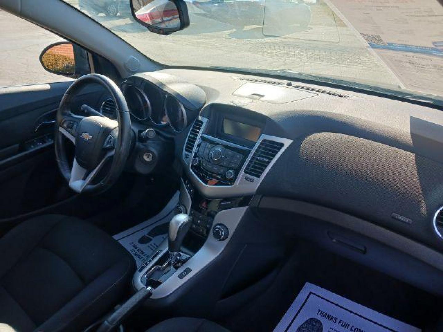 2014 Black Granite Metallic Chevrolet Cruze 1LT Auto (1G1PC5SB2E7) with an 1.4L L4 DOHC 16V TURBO engine, 6-Speed Automatic transmission, located at 880 E. National Road, Vandalia, OH, 45377, (937) 908-9800, 39.892189, -84.181015 - Photo#8