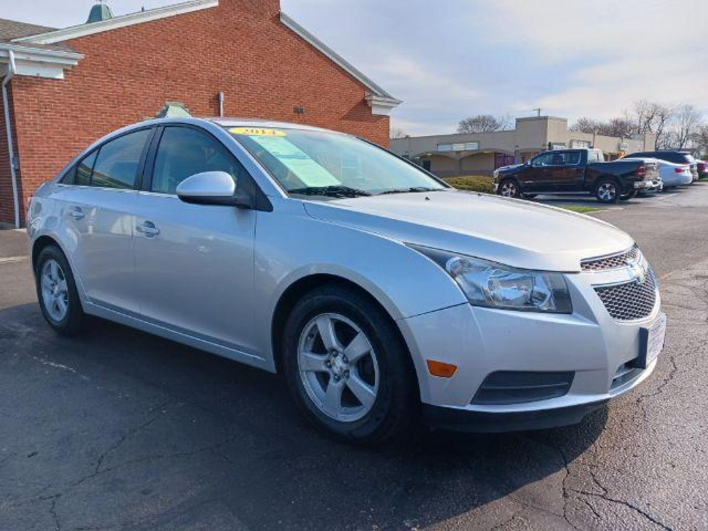 2014 Silver Ice Metallic Chevrolet Cruze 1LT Auto (1G1PC5SB0E7) with an 1.4L L4 DOHC 16V TURBO engine, 6-Speed Automatic transmission, located at 401 Woodman Dr, Riverside, OH, 45431, (937) 908-9800, 39.763779, -84.122063 - Photo#0