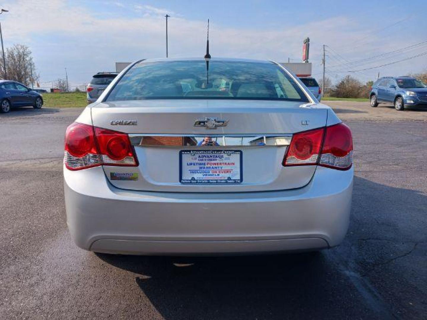 2014 Silver Ice Metallic Chevrolet Cruze 1LT Auto (1G1PC5SB0E7) with an 1.4L L4 DOHC 16V TURBO engine, 6-Speed Automatic transmission, located at 401 Woodman Dr, Riverside, OH, 45431, (937) 908-9800, 39.763779, -84.122063 - Photo#5