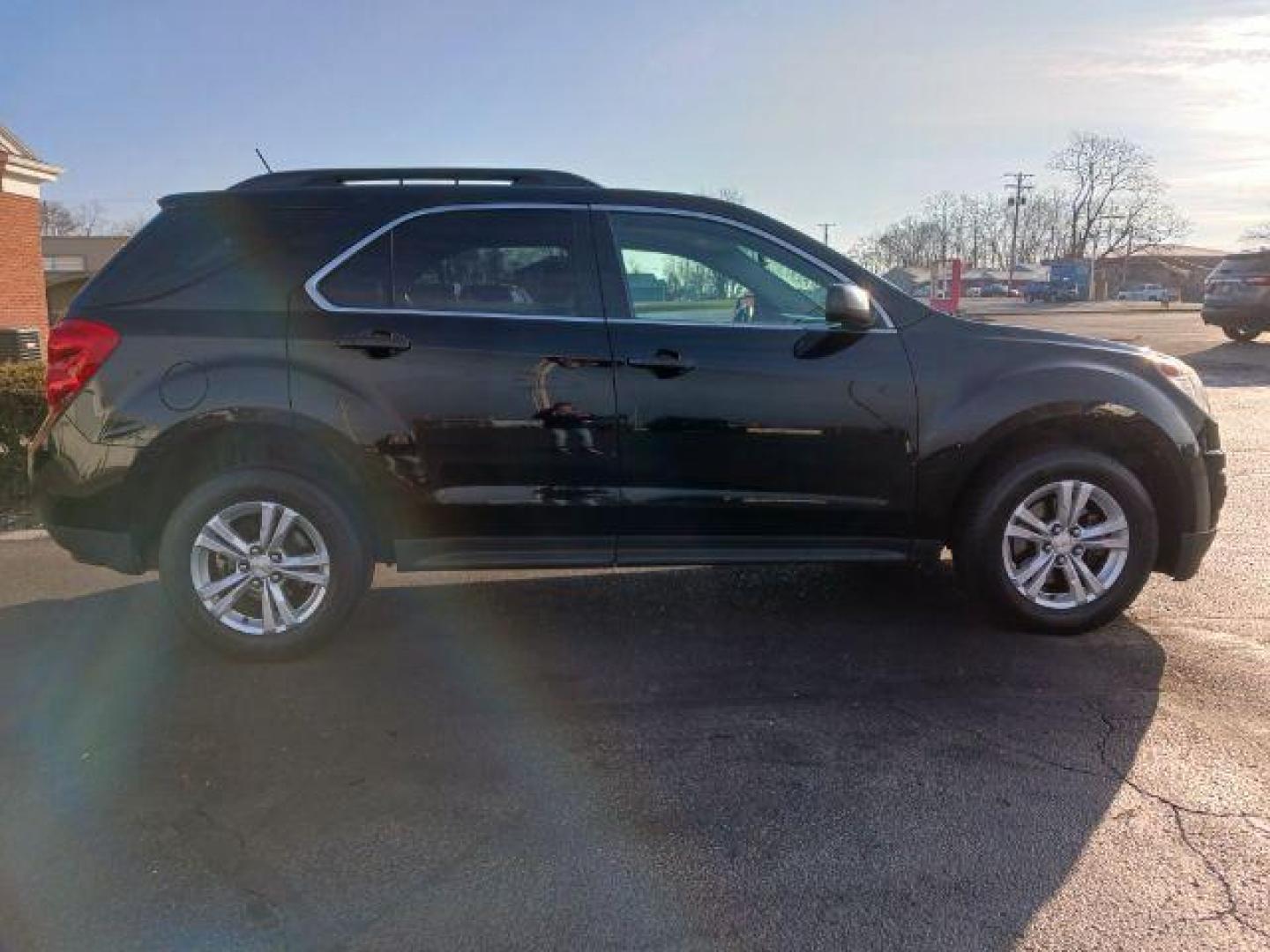 2014 Black Chevrolet Equinox 1LT 2WD (2GNALBEK1E6) with an 2.4L L4 DOHC 16V FFV engine, 6-Speed Automatic transmission, located at 880 E. National Road, Vandalia, OH, 45377, (937) 908-9800, 39.892189, -84.181015 - Photo#4