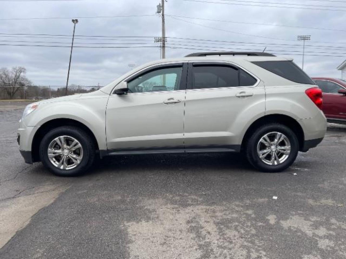 2014 Champagne Silver Metallic Chevrolet Equinox 1LT 2WD (2GNALBEK0E6) with an 2.4L L4 DOHC 16V FFV engine, 6-Speed Automatic transmission, located at 401 Woodman Dr, Riverside, OH, 45431, (937) 908-9800, 39.763779, -84.122063 - Photo#2