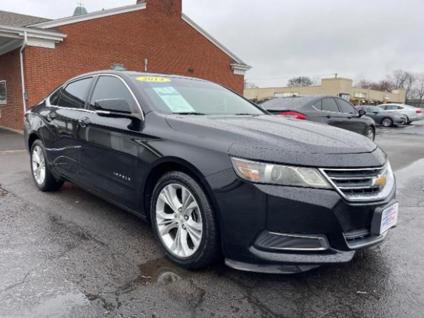 2014 Black Chevrolet Impala 2LT (2G1125S32E9) with an 3.6L V6 DOHC 24VV FFV engine, 6-Speed Automatic transmission, located at 1951 S Dayton Lakeview Rd., New Carlisle, OH, 45344, (937) 908-9800, 39.890999, -84.050255 - Photo#0