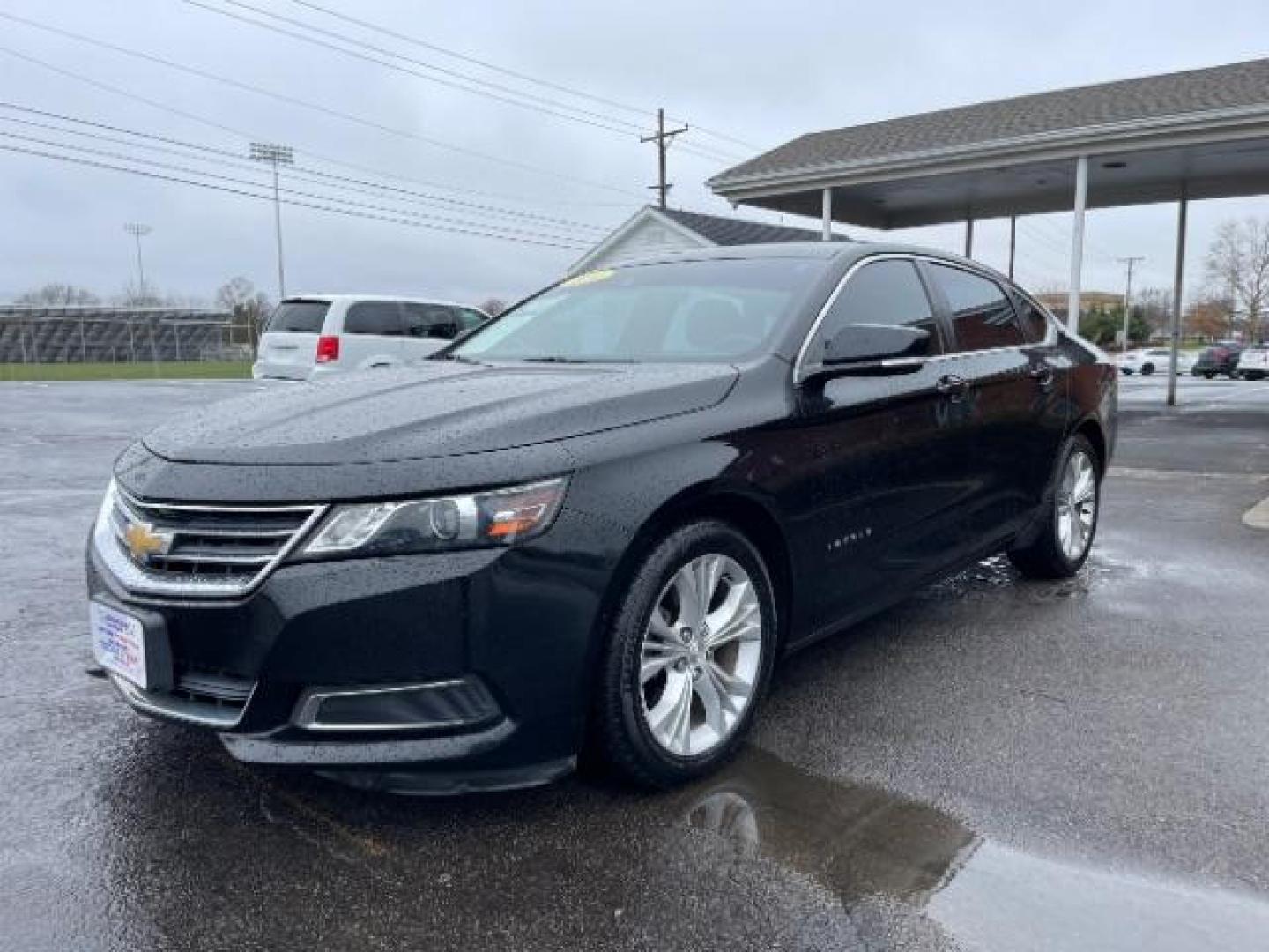 2014 Black Chevrolet Impala 2LT (2G1125S32E9) with an 3.6L V6 DOHC 24VV FFV engine, 6-Speed Automatic transmission, located at 1951 S Dayton Lakeview Rd., New Carlisle, OH, 45344, (937) 908-9800, 39.890999, -84.050255 - Photo#1