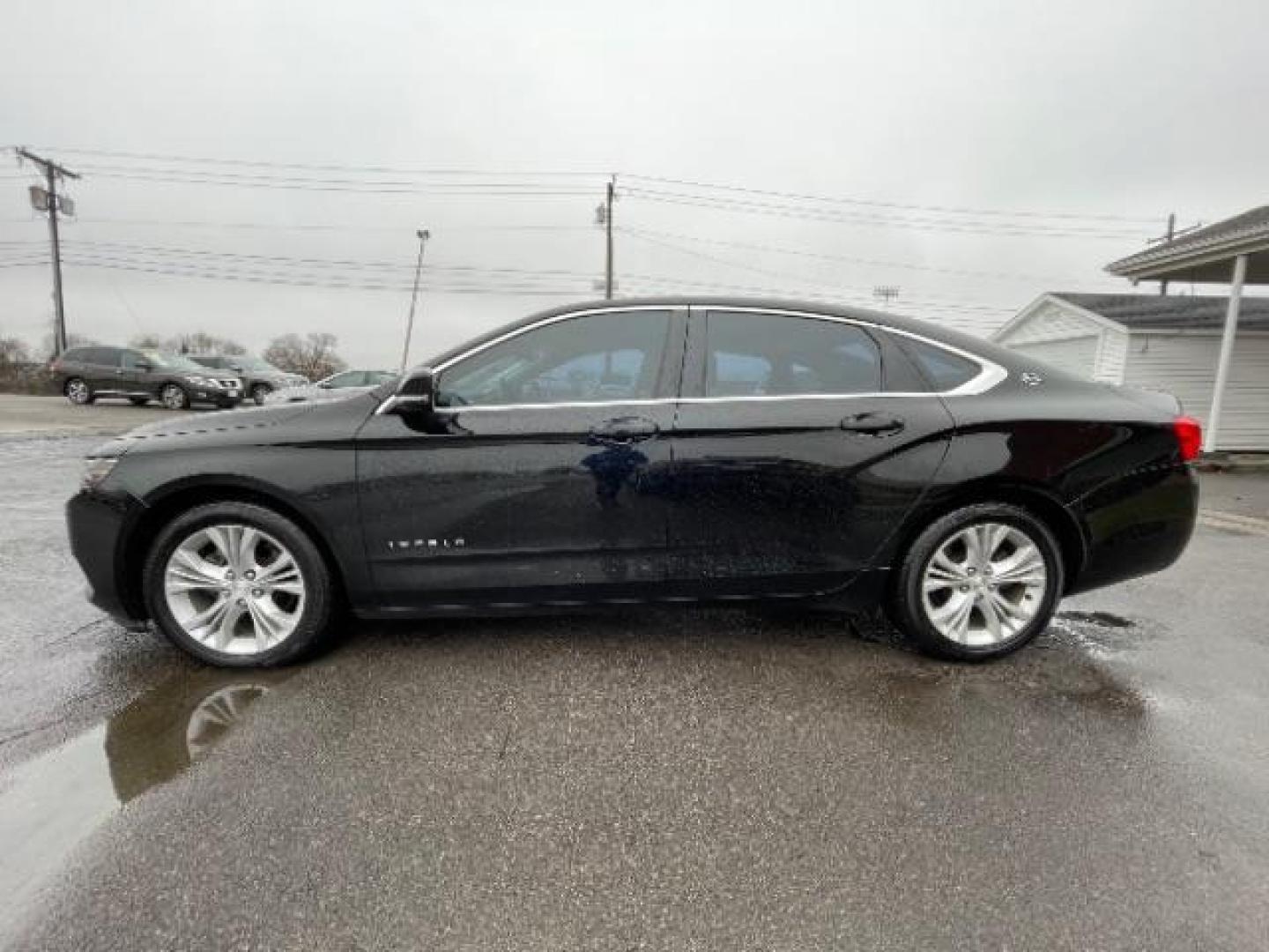 2014 Black Chevrolet Impala 2LT (2G1125S32E9) with an 3.6L V6 DOHC 24VV FFV engine, 6-Speed Automatic transmission, located at 1951 S Dayton Lakeview Rd., New Carlisle, OH, 45344, (937) 908-9800, 39.890999, -84.050255 - Photo#2