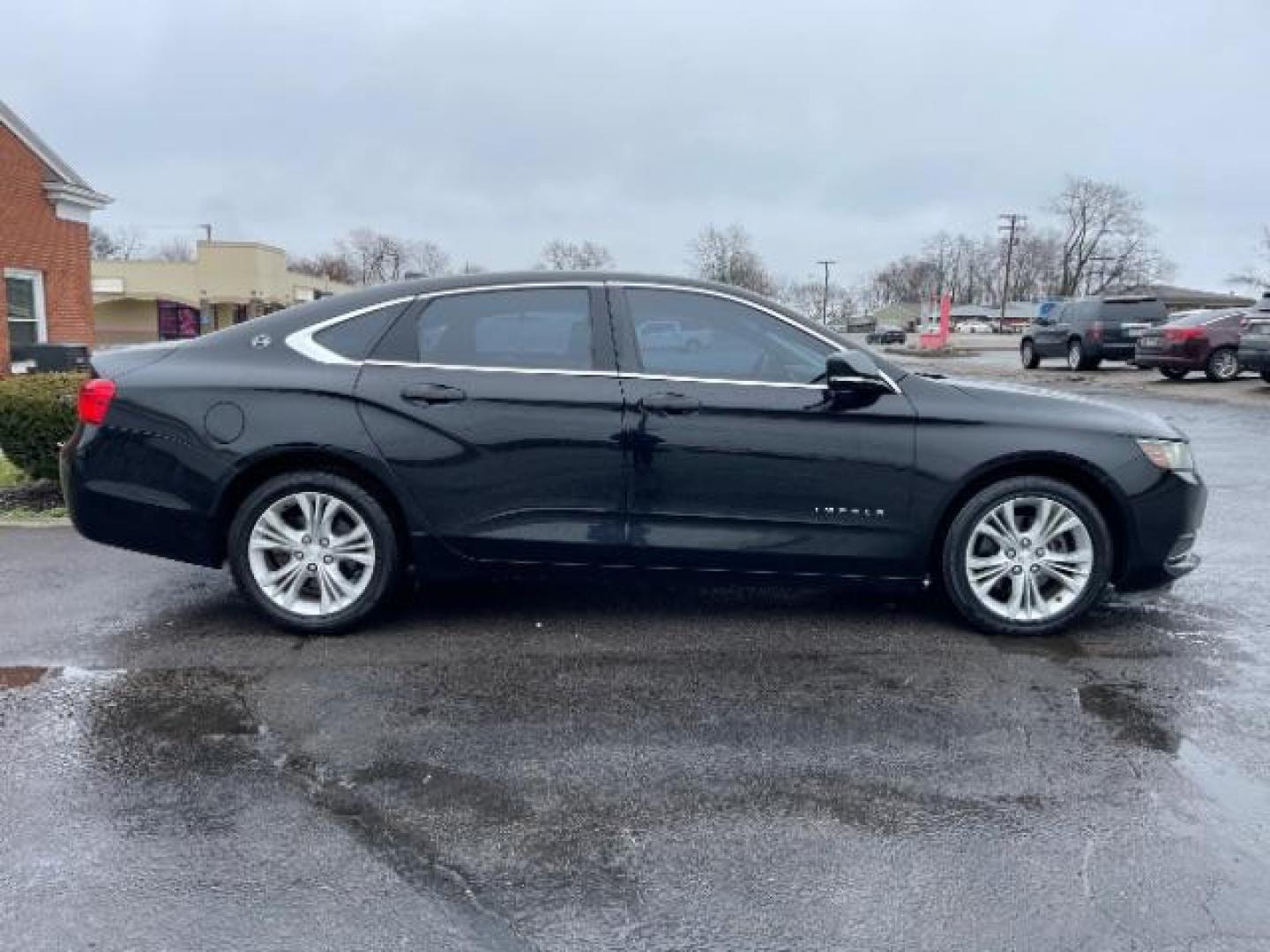 2014 Black Chevrolet Impala 2LT (2G1125S32E9) with an 3.6L V6 DOHC 24VV FFV engine, 6-Speed Automatic transmission, located at 1951 S Dayton Lakeview Rd., New Carlisle, OH, 45344, (937) 908-9800, 39.890999, -84.050255 - Photo#3