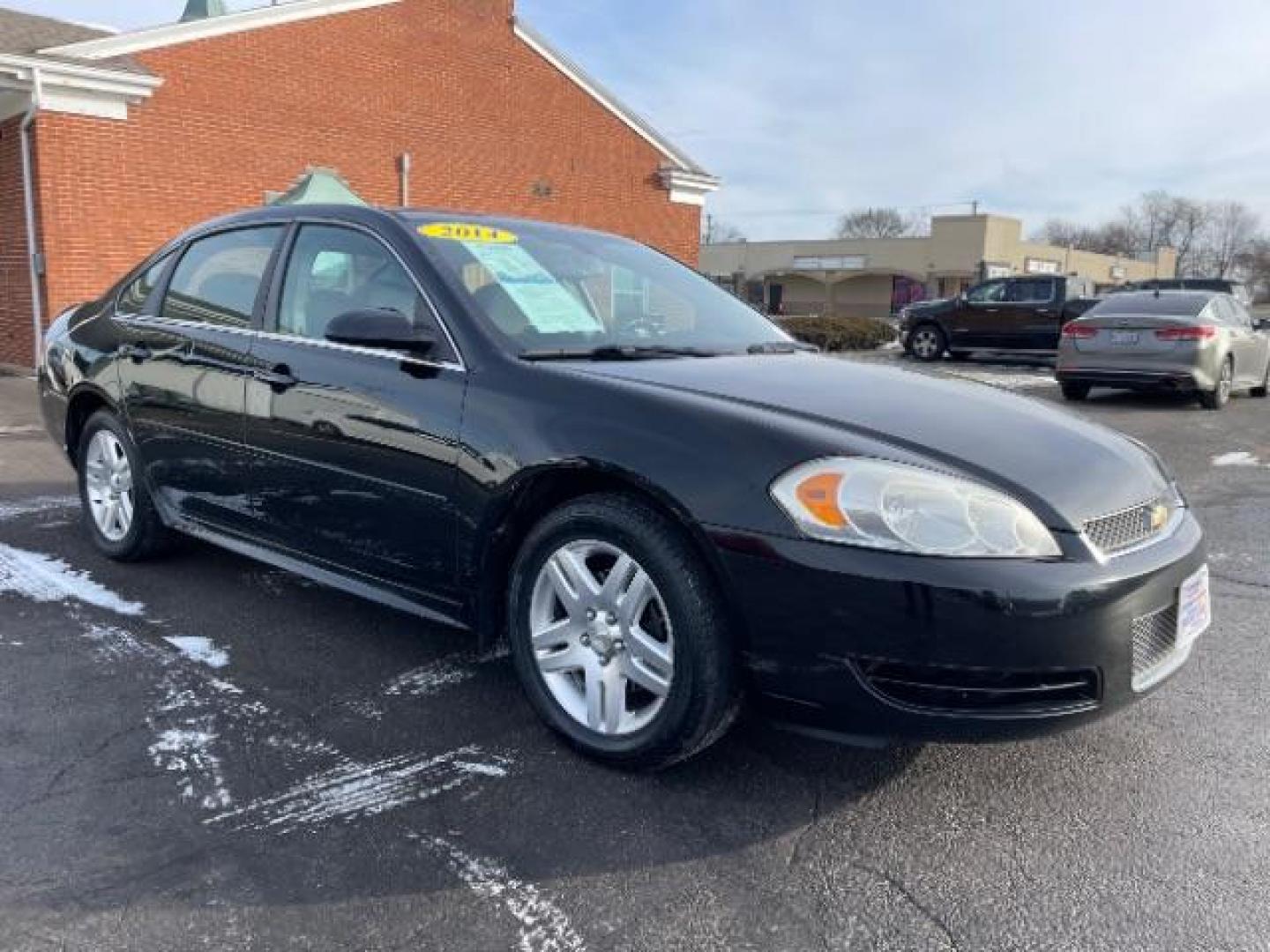 2014 Black Chevrolet Impala Limited LT (2G1WB5E37E1) with an 3.6L V6 DOHC 16V FFV engine, 6-Speed Automatic transmission, located at 1184 Kauffman Ave, Fairborn, OH, 45324, (937) 908-9800, 39.807365, -84.029114 - Photo#0