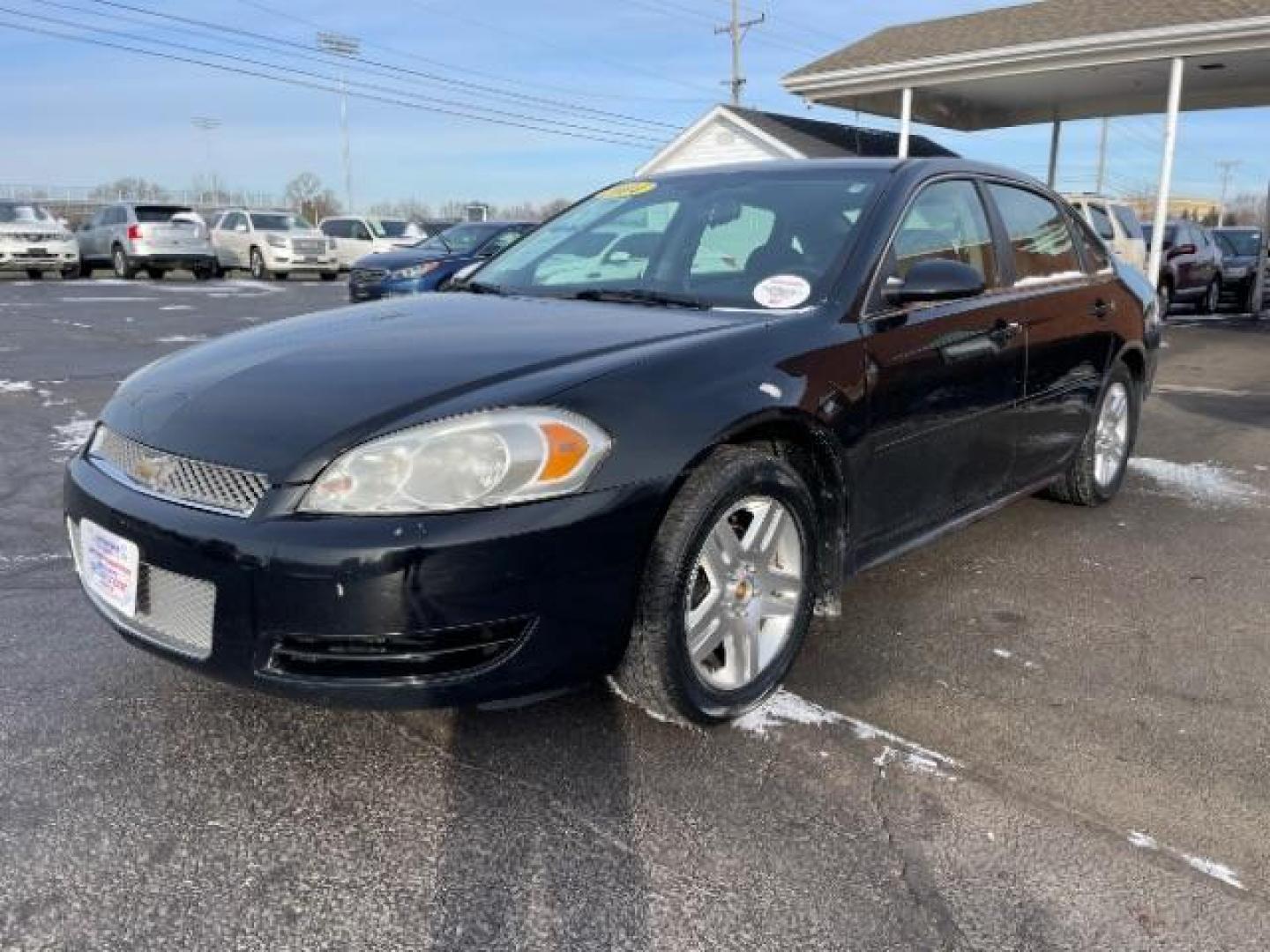 2014 Black Chevrolet Impala Limited LT (2G1WB5E37E1) with an 3.6L V6 DOHC 16V FFV engine, 6-Speed Automatic transmission, located at 1184 Kauffman Ave, Fairborn, OH, 45324, (937) 908-9800, 39.807365, -84.029114 - Photo#1