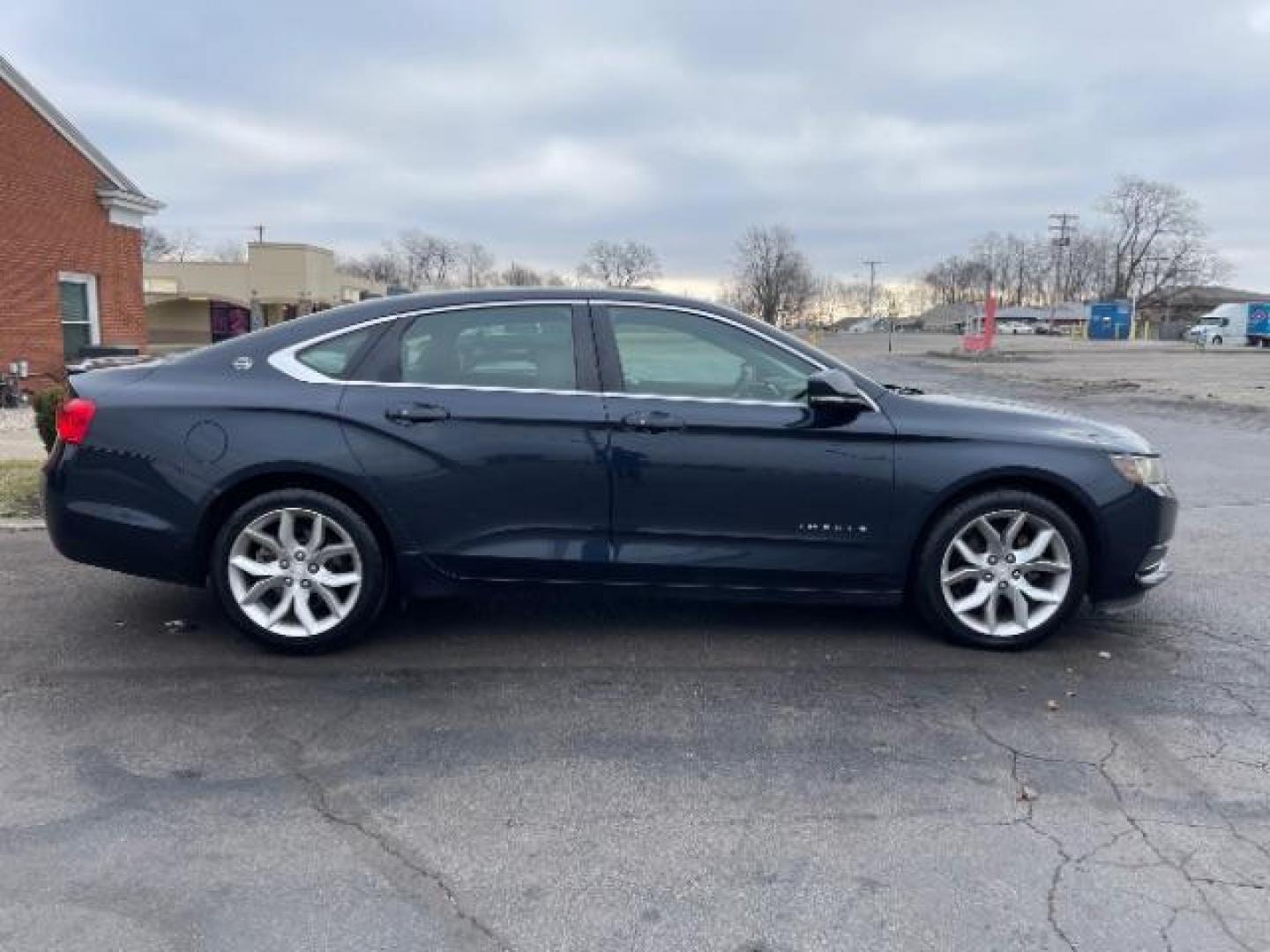 2014 Blue Topaz Metallic Chevrolet Impala 2LT (2G1125S33E9) with an 3.6L V6 DOHC 24VV FFV engine, 6-Speed Automatic transmission, located at 401 Woodman Dr, Riverside, OH, 45431, (937) 908-9800, 39.763779, -84.122063 - Photo#3