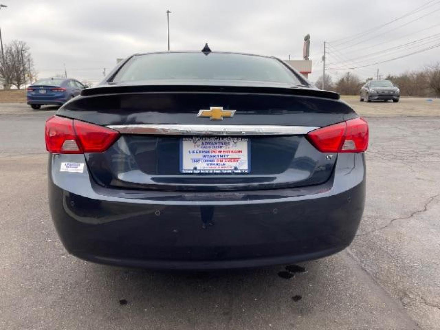 2014 Blue Topaz Metallic Chevrolet Impala 2LT (2G1125S33E9) with an 3.6L V6 DOHC 24VV FFV engine, 6-Speed Automatic transmission, located at 401 Woodman Dr, Riverside, OH, 45431, (937) 908-9800, 39.763779, -84.122063 - Photo#5