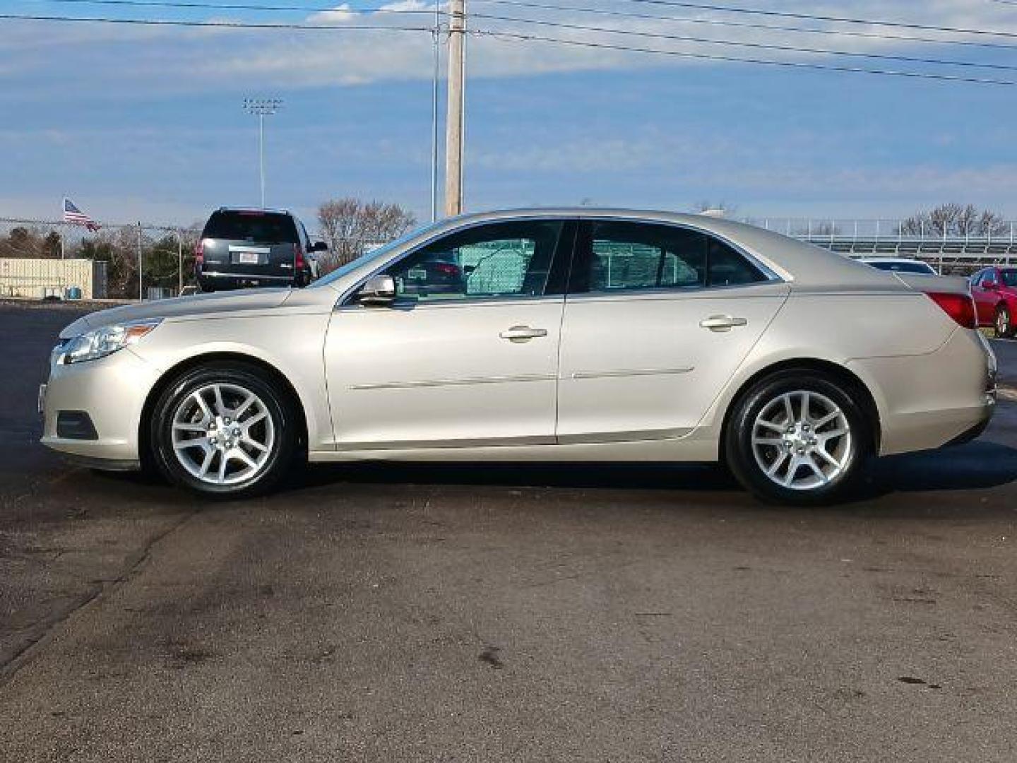 2014 Champagne Silver Metallic Chevrolet Malibu 1LT (1G11C5SL6EF) with an 2.5L L4 DOHC 16V engine, 6-Speed Automatic transmission, located at 880 E. National Road, Vandalia, OH, 45377, (937) 908-9800, 39.892189, -84.181015 - Photo#3