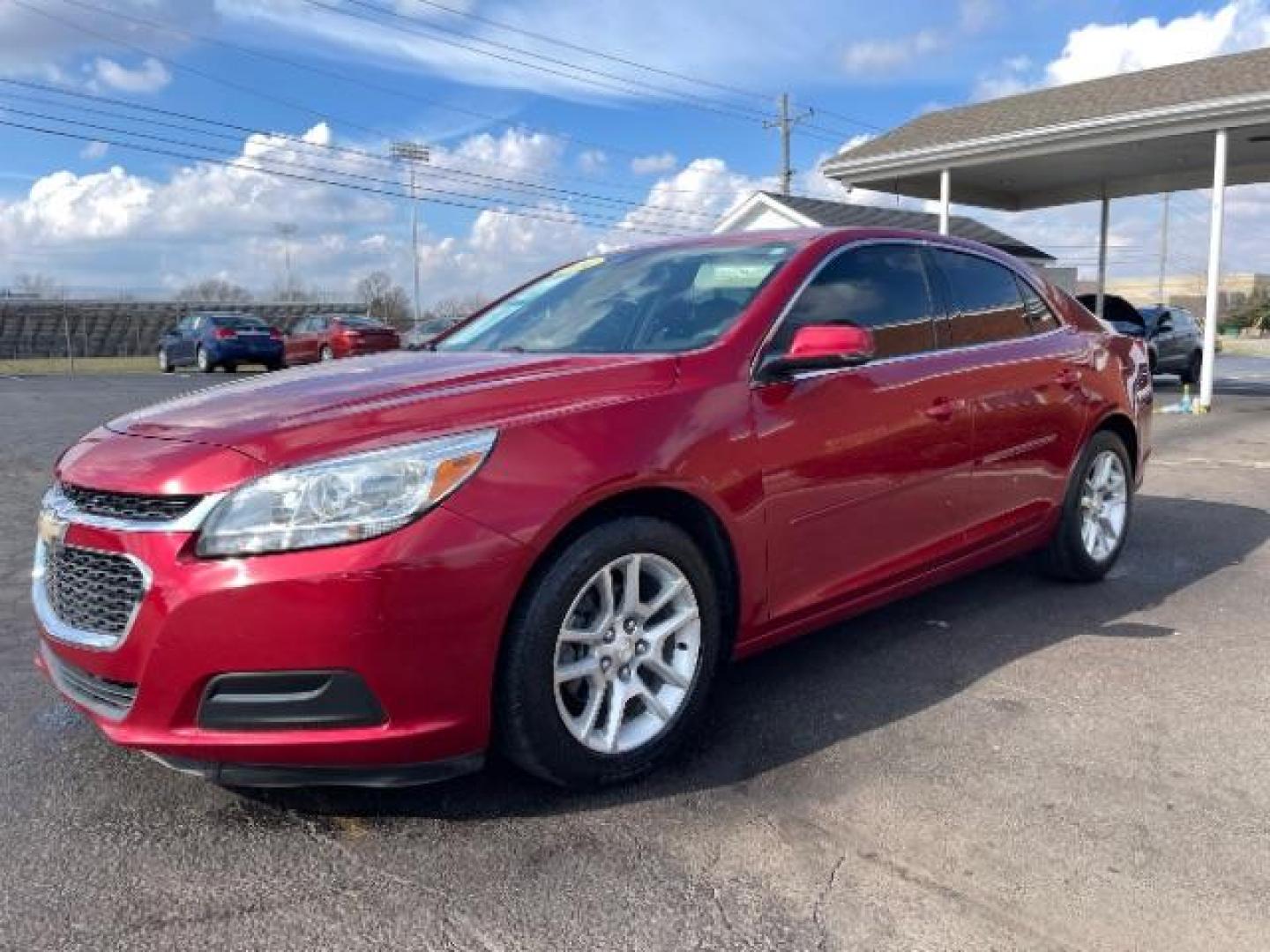 2014 Butte Red Metallic Chevrolet Malibu 1LT (1G11C5SL7EF) with an 2.5L L4 DOHC 16V engine, 6-Speed Automatic transmission, located at 401 Woodman Dr, Riverside, OH, 45431, (937) 908-9800, 39.763779, -84.122063 - Photo#1