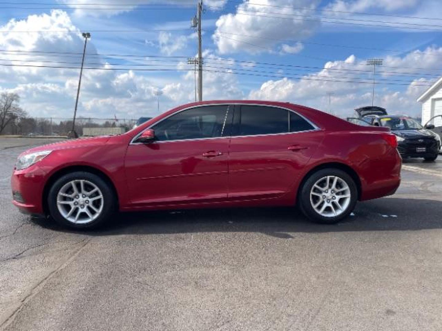 2014 Butte Red Metallic Chevrolet Malibu 1LT (1G11C5SL7EF) with an 2.5L L4 DOHC 16V engine, 6-Speed Automatic transmission, located at 401 Woodman Dr, Riverside, OH, 45431, (937) 908-9800, 39.763779, -84.122063 - Photo#2