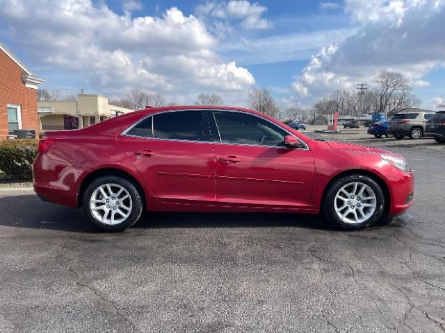 2014 Butte Red Metallic Chevrolet Malibu 1LT (1G11C5SL7EF) with an 2.5L L4 DOHC 16V engine, 6-Speed Automatic transmission, located at 401 Woodman Dr, Riverside, OH, 45431, (937) 908-9800, 39.763779, -84.122063 - Photo#3