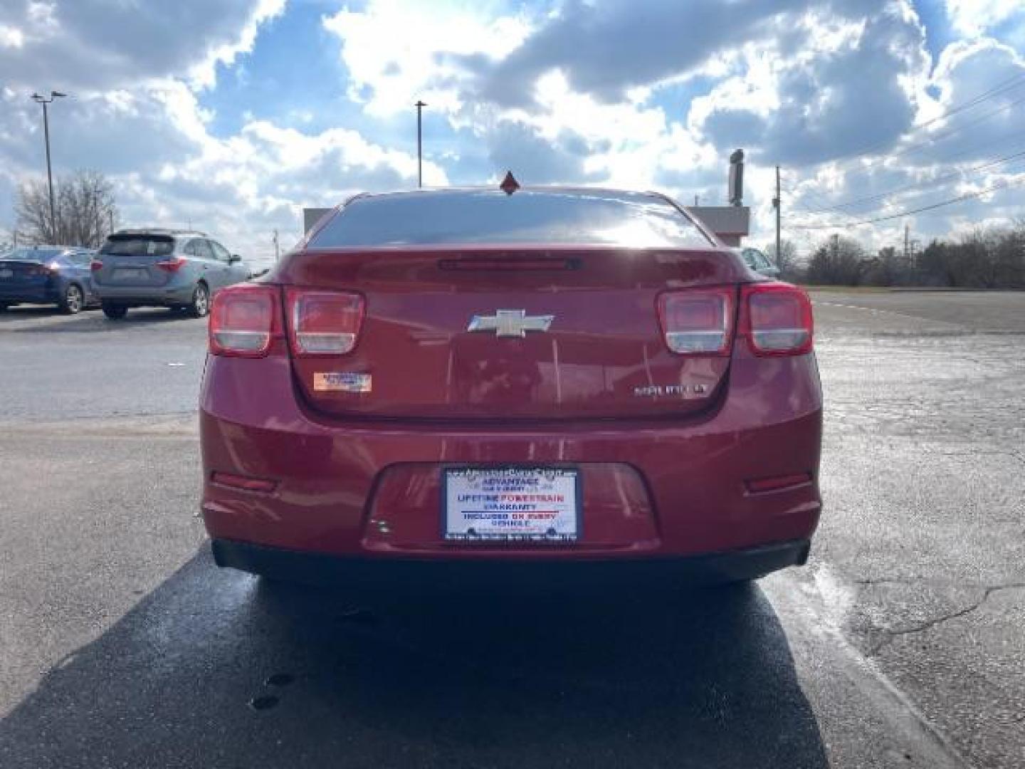 2014 Butte Red Metallic Chevrolet Malibu 1LT (1G11C5SL7EF) with an 2.5L L4 DOHC 16V engine, 6-Speed Automatic transmission, located at 401 Woodman Dr, Riverside, OH, 45431, (937) 908-9800, 39.763779, -84.122063 - Photo#5