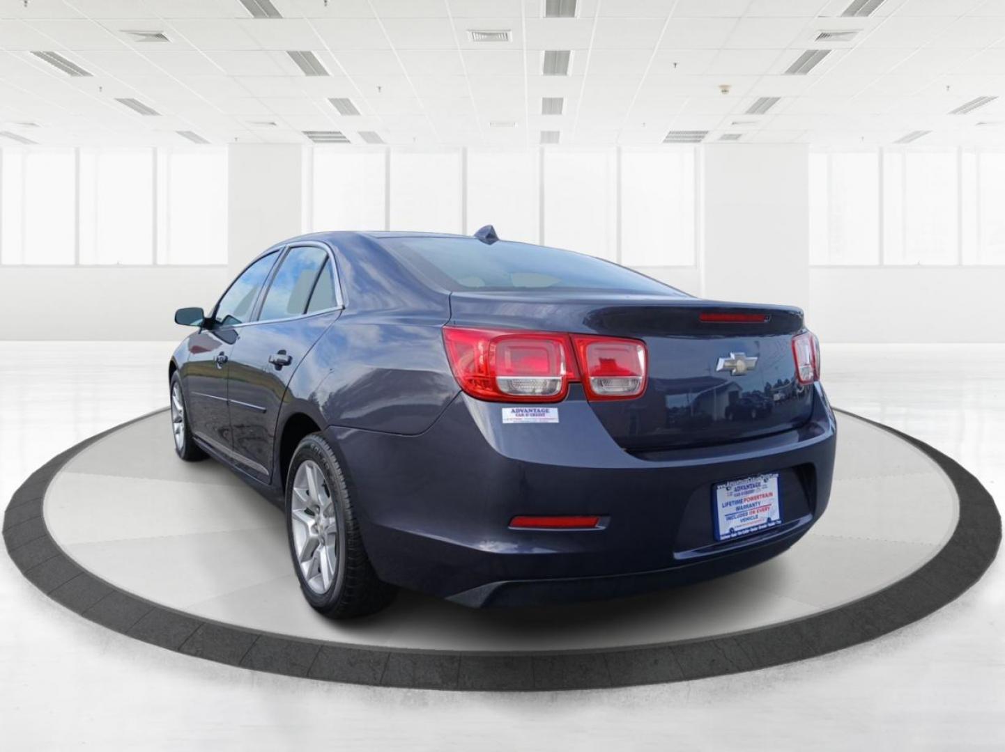 2014 Atlantis Blue Metallic Chevrolet Malibu 1LT (1G11C5SL5EF) with an 2.5L L4 DOHC 16V engine, 6-Speed Automatic transmission, located at 1184 Kauffman Ave, Fairborn, OH, 45324, (937) 908-9800, 39.807365, -84.029114 - Photo#4