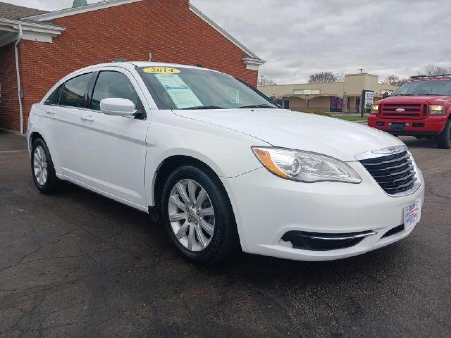 2014 Bright White Clearcoat Chrysler 200 Touring (1C3CCBBG1EN) with an 3.6L V6 DOHC 24V FFV engine, 6-Speed Automatic transmission, located at 1099 N County Rd 25A, OH, 45373, (937) 908-9800, 40.057079, -84.212883 - Photo#0