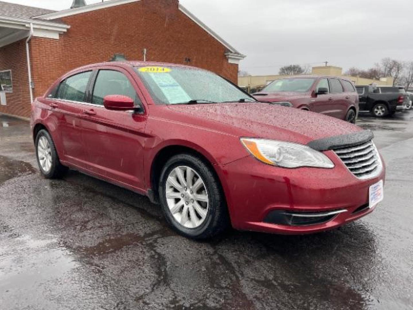 2014 Dp Cherry Red Crystal PC Chrysler 200 Touring (1C3CCBBG0EN) with an 3.6L V6 DOHC 24V FFV engine, 6-Speed Automatic transmission, located at 401 Woodman Dr, Riverside, OH, 45431, (937) 908-9800, 39.763779, -84.122063 - Photo#0