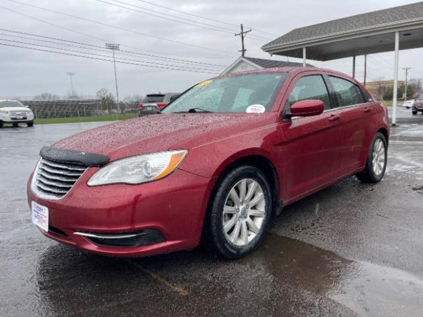 2014 Dp Cherry Red Crystal PC Chrysler 200 Touring (1C3CCBBG0EN) with an 3.6L V6 DOHC 24V FFV engine, 6-Speed Automatic transmission, located at 401 Woodman Dr, Riverside, OH, 45431, (937) 908-9800, 39.763779, -84.122063 - Photo#1