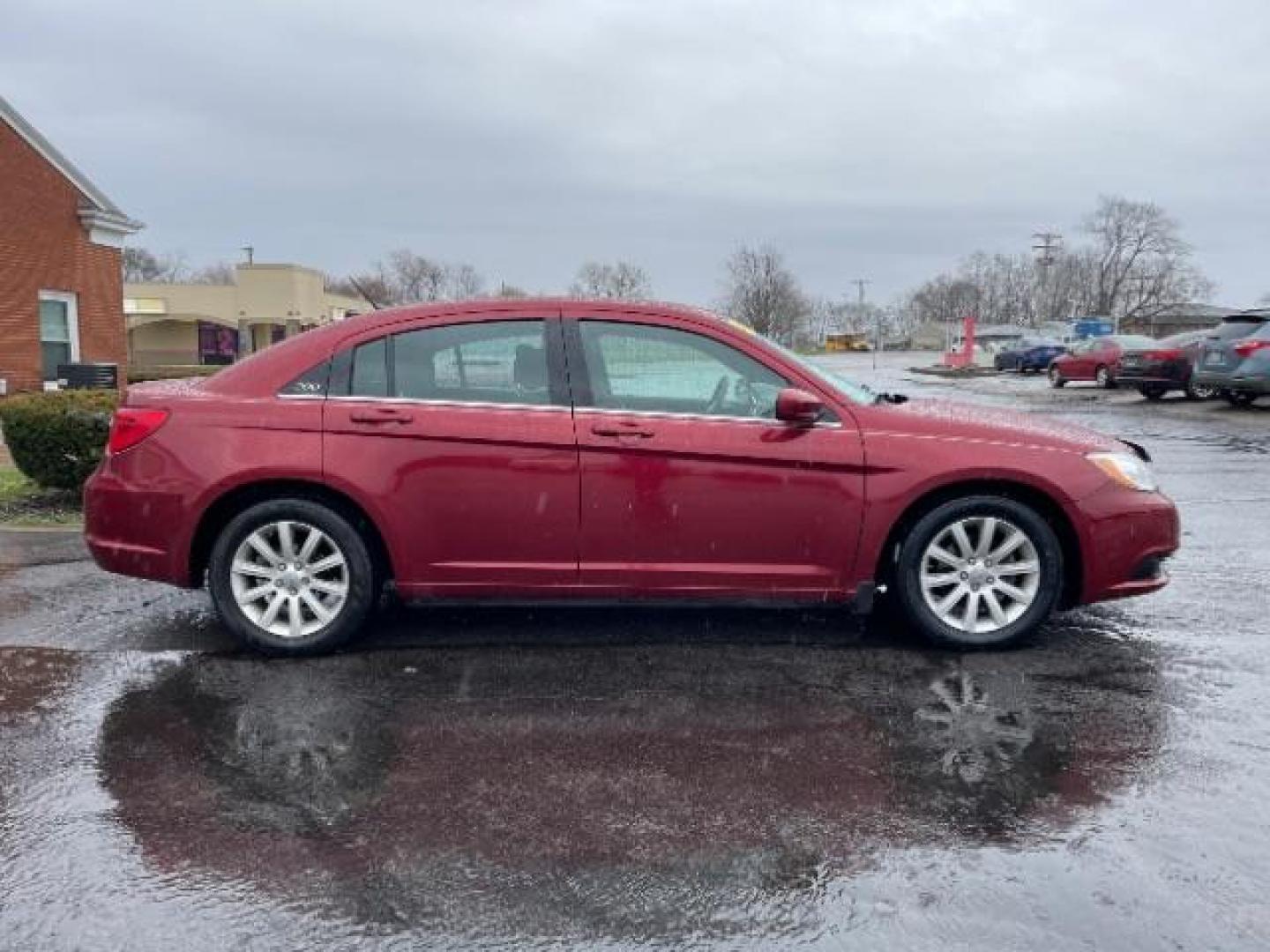 2014 Dp Cherry Red Crystal PC Chrysler 200 Touring (1C3CCBBG0EN) with an 3.6L V6 DOHC 24V FFV engine, 6-Speed Automatic transmission, located at 401 Woodman Dr, Riverside, OH, 45431, (937) 908-9800, 39.763779, -84.122063 - Photo#4