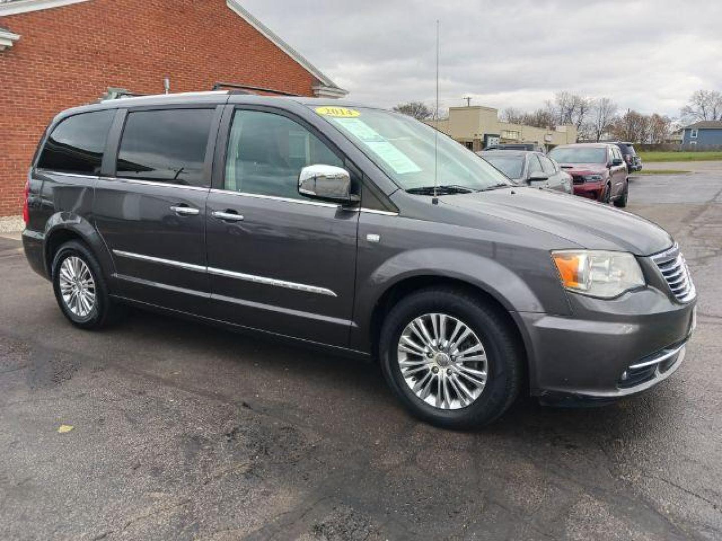 2014 Granite Crystal Met CC Chrysler Town and Country Touring-L (2C4RC1CG8ER) with an 3.6L V6 DOHC 24V engine, 6-Speed Automatic transmission, located at 401 Woodman Dr, Riverside, OH, 45431, (937) 908-9800, 39.763779, -84.122063 - Photo#0