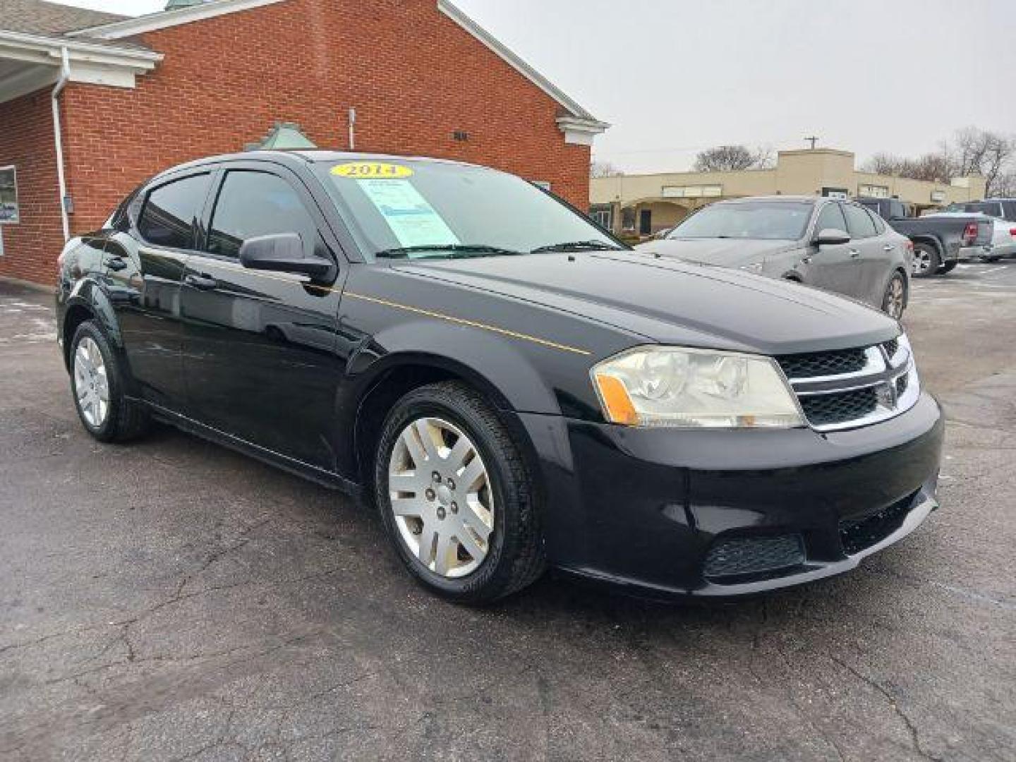 2014 Black Clearcoat Dodge Avenger SE (1C3CDZAB1EN) with an 2.4L L4 DOHC 16V engine, 4-Speed Automatic transmission, located at 1951 S Dayton Lakeview Rd., New Carlisle, OH, 45344, (937) 908-9800, 39.890999, -84.050255 - Photo#0