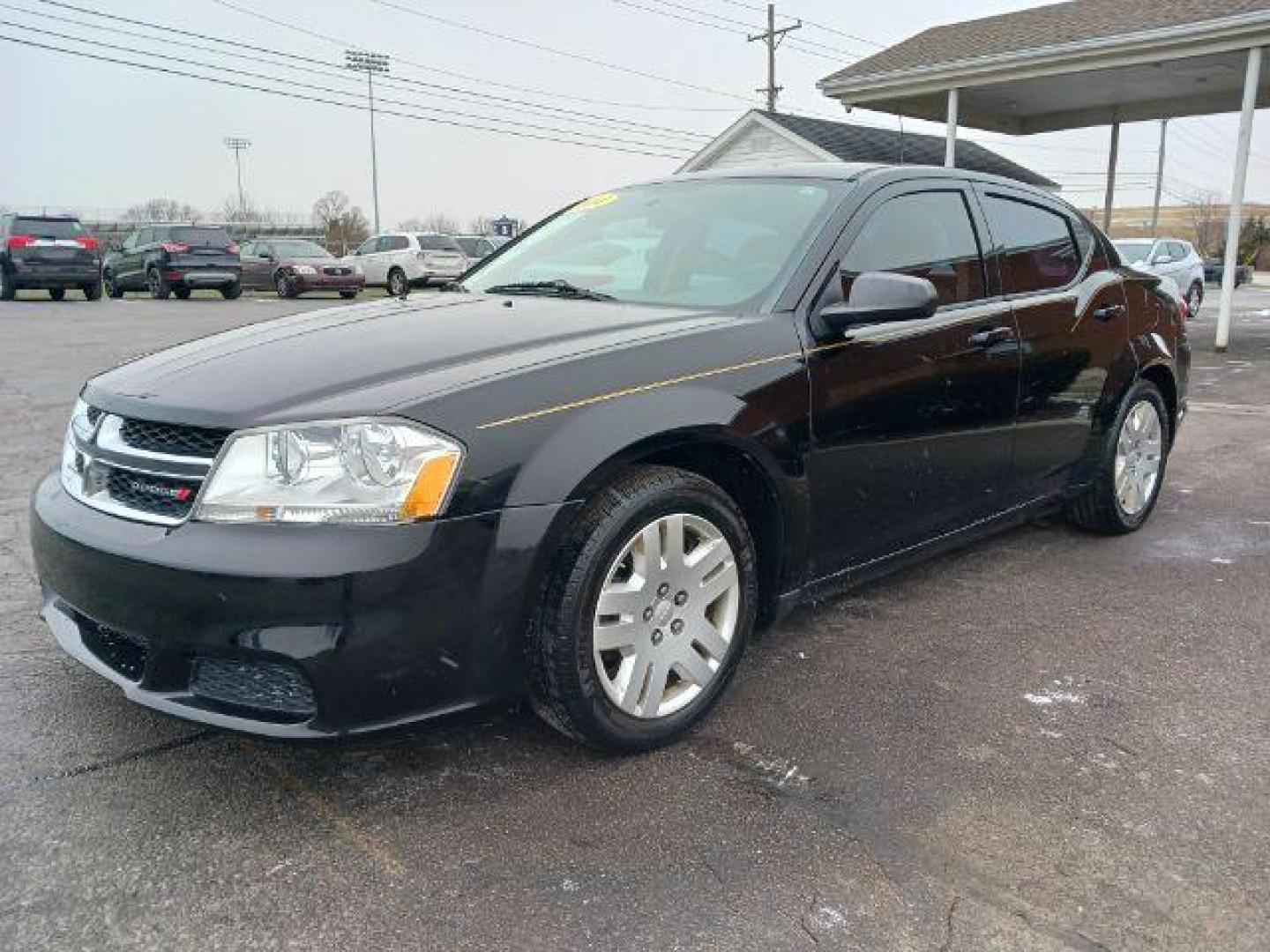 2014 Black Clearcoat Dodge Avenger SE (1C3CDZAB1EN) with an 2.4L L4 DOHC 16V engine, 4-Speed Automatic transmission, located at 1951 S Dayton Lakeview Rd., New Carlisle, OH, 45344, (937) 908-9800, 39.890999, -84.050255 - Photo#2