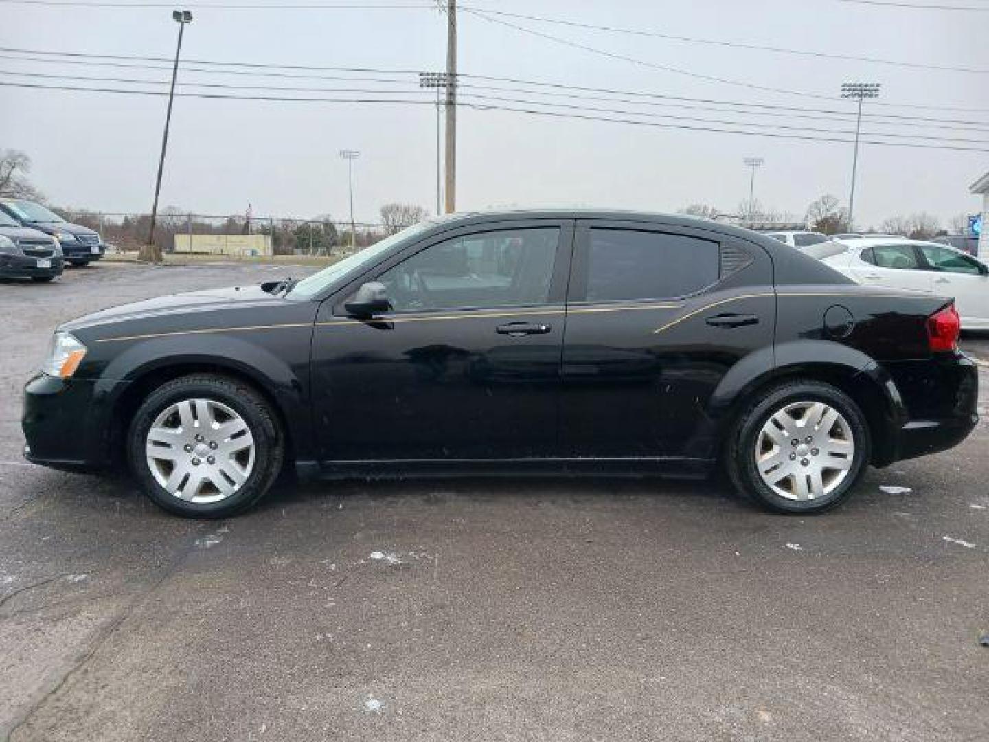 2014 Black Clearcoat Dodge Avenger SE (1C3CDZAB1EN) with an 2.4L L4 DOHC 16V engine, 4-Speed Automatic transmission, located at 1951 S Dayton Lakeview Rd., New Carlisle, OH, 45344, (937) 908-9800, 39.890999, -84.050255 - Photo#3