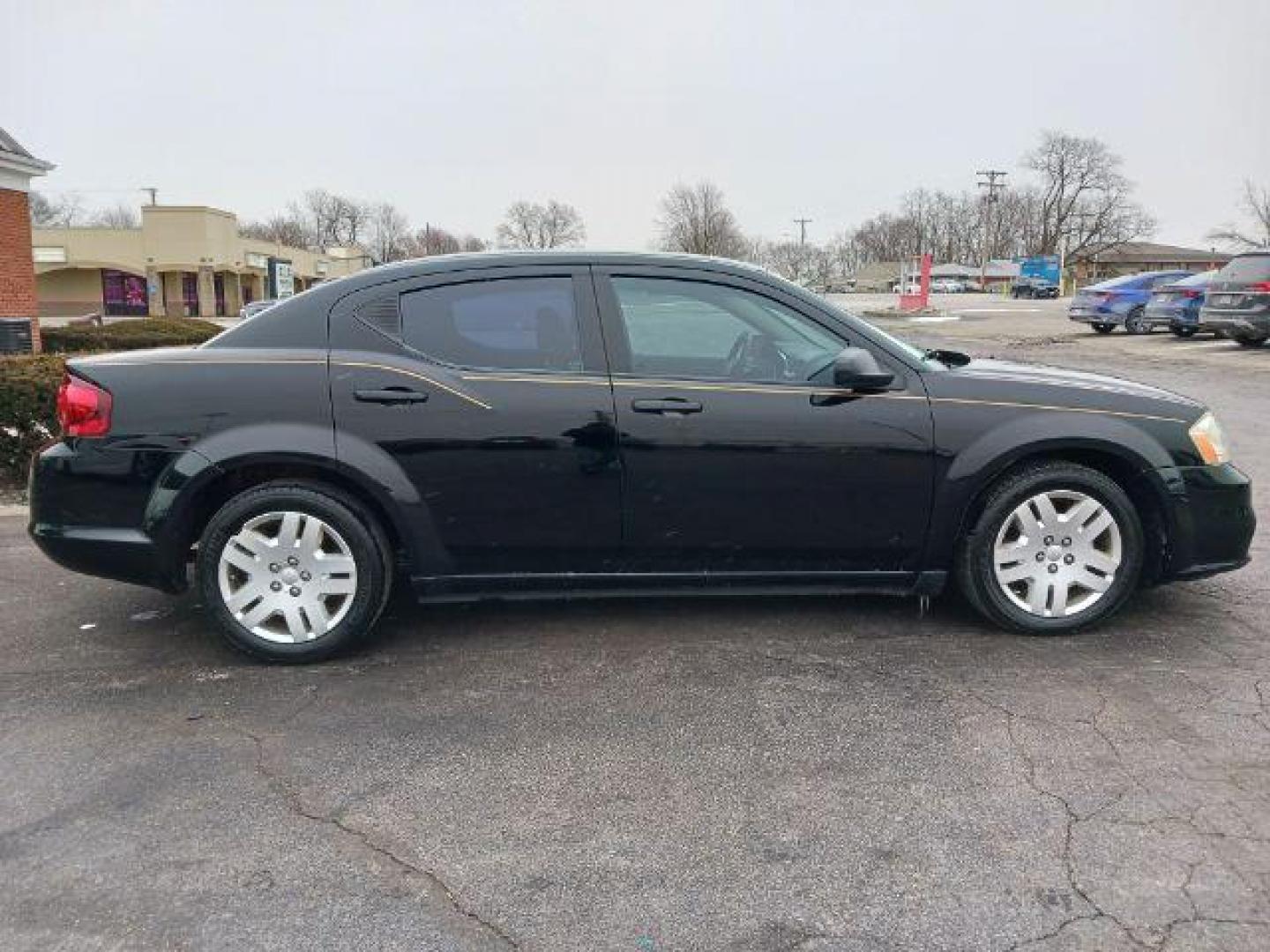 2014 Black Clearcoat Dodge Avenger SE (1C3CDZAB1EN) with an 2.4L L4 DOHC 16V engine, 4-Speed Automatic transmission, located at 1951 S Dayton Lakeview Rd., New Carlisle, OH, 45344, (937) 908-9800, 39.890999, -84.050255 - Photo#4