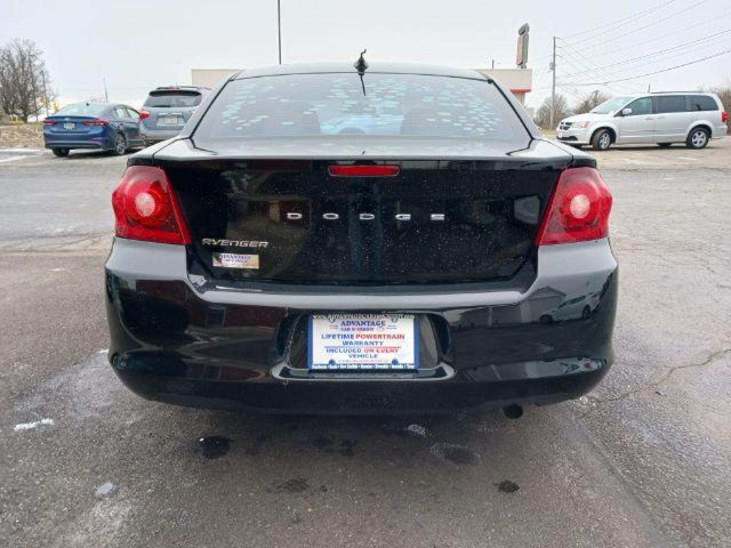 2014 Black Clearcoat Dodge Avenger SE (1C3CDZAB1EN) with an 2.4L L4 DOHC 16V engine, 4-Speed Automatic transmission, located at 1951 S Dayton Lakeview Rd., New Carlisle, OH, 45344, (937) 908-9800, 39.890999, -84.050255 - Photo#5