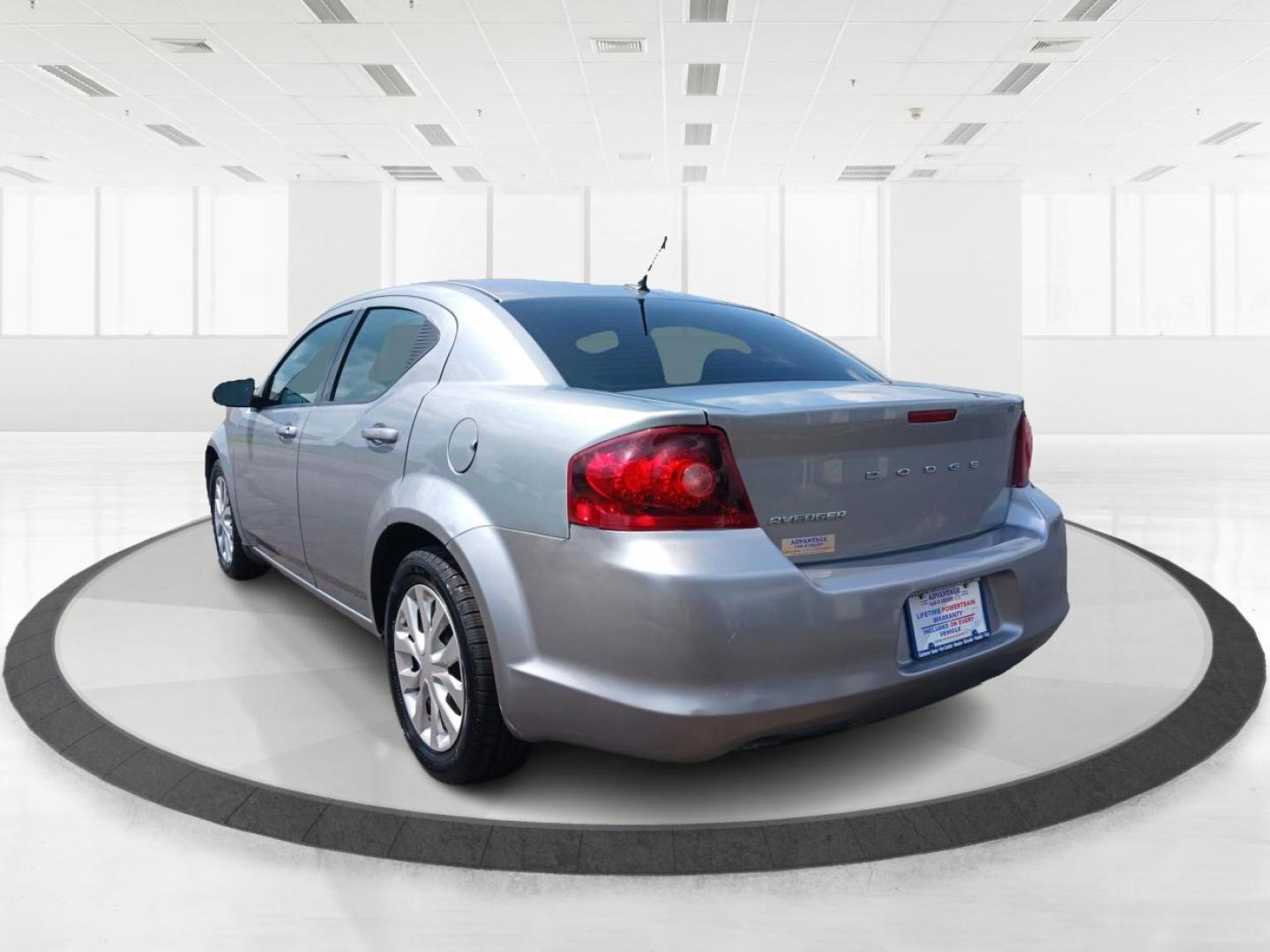 2014 Billet Silver Metallic CC Dodge Avenger (1C3CDZAB5EN) with an 2.4L L4 DOHC 16V engine, 4-Speed Automatic transmission, located at 880 E. National Road, Vandalia, OH, 45377, (937) 908-9800, 39.892189, -84.181015 - Photo#4