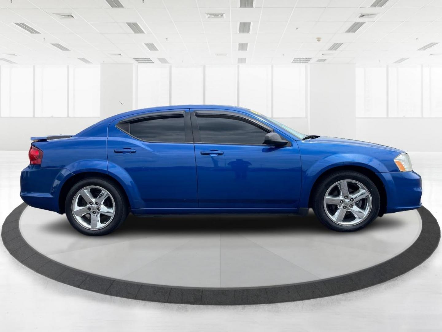 2014 Blue Streak Pearlcoat Dodge Avenger SE (1C3CDZAG1EN) with an 3.6L V6 DOHC 24V FFV engine, 6-Speed Automatic transmission, located at 1184 Kauffman Ave, Fairborn, OH, 45324, (937) 908-9800, 39.807365, -84.029114 - Photo#1