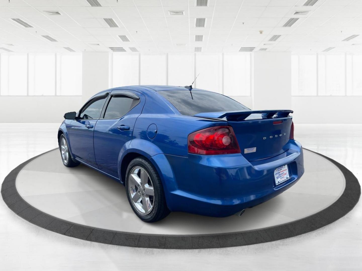 2014 Blue Streak Pearlcoat Dodge Avenger SE (1C3CDZAG1EN) with an 3.6L V6 DOHC 24V FFV engine, 6-Speed Automatic transmission, located at 1184 Kauffman Ave, Fairborn, OH, 45324, (937) 908-9800, 39.807365, -84.029114 - Photo#4