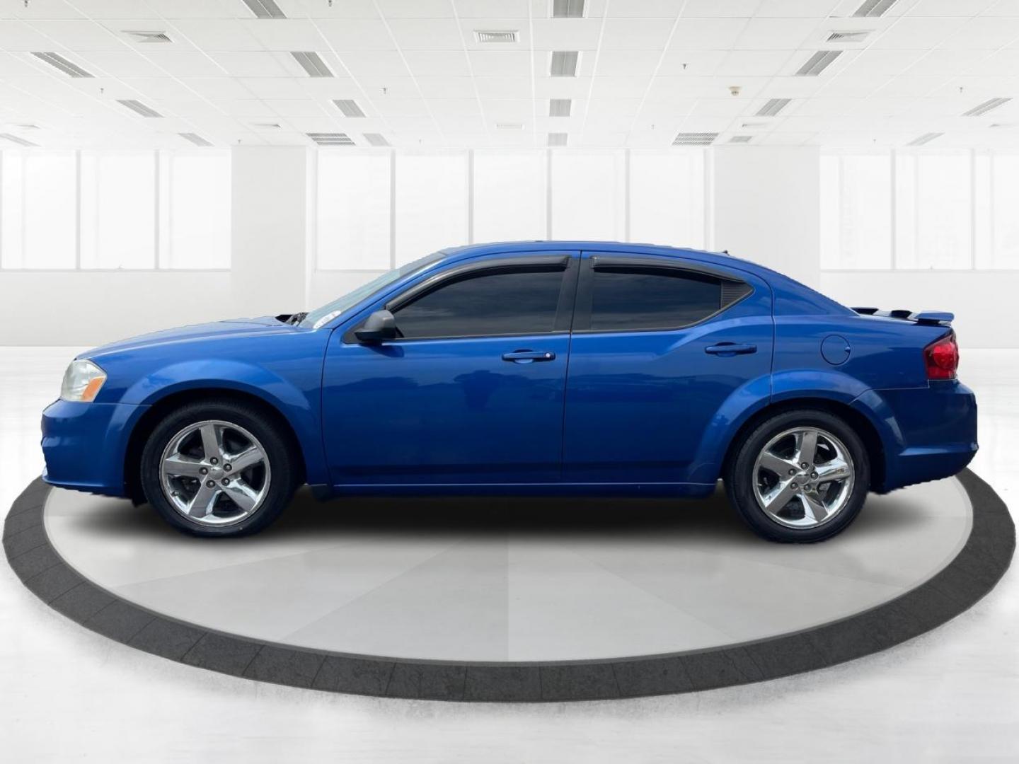 2014 Blue Streak Pearlcoat Dodge Avenger SE (1C3CDZAG1EN) with an 3.6L V6 DOHC 24V FFV engine, 6-Speed Automatic transmission, located at 1184 Kauffman Ave, Fairborn, OH, 45324, (937) 908-9800, 39.807365, -84.029114 - Photo#5