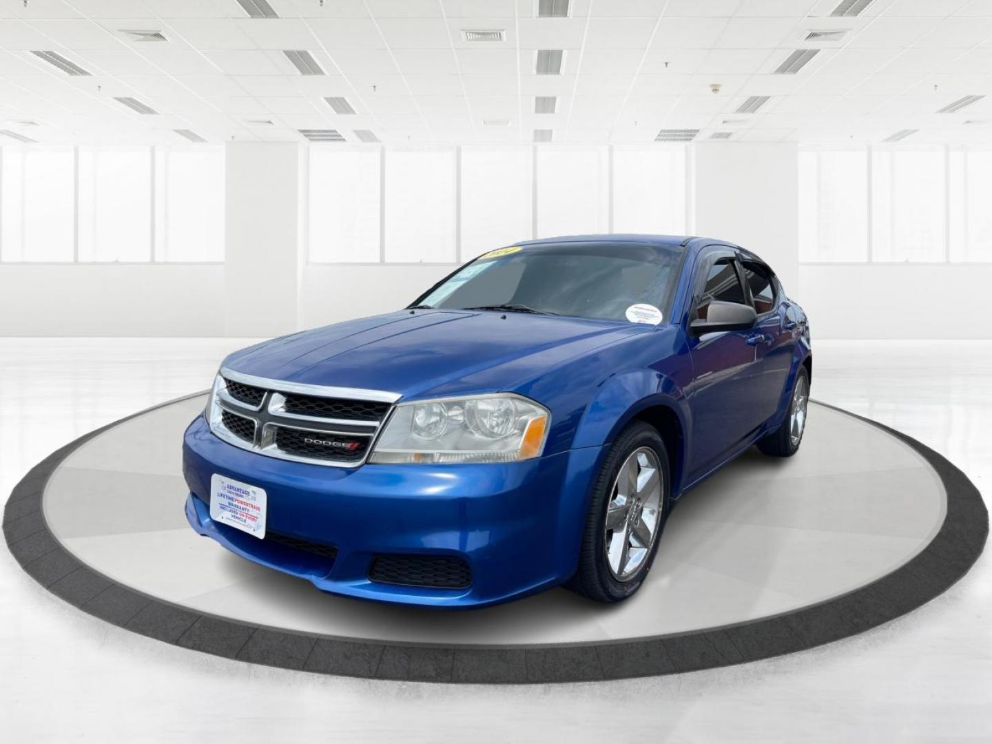 2014 Blue Streak Pearlcoat Dodge Avenger SE (1C3CDZAG1EN) with an 3.6L V6 DOHC 24V FFV engine, 6-Speed Automatic transmission, located at 1184 Kauffman Ave, Fairborn, OH, 45324, (937) 908-9800, 39.807365, -84.029114 - Photo#7