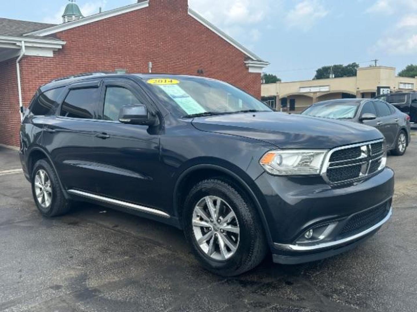 2014 Granite Crystal Met CC Dodge Durango Limited AWD (1C4RDJDG3EC) with an 3.6L V6 DOHC 24V engine, 8-Speed Automatic transmission, located at 1184 Kauffman Ave, Fairborn, OH, 45324, (937) 908-9800, 39.807365, -84.029114 - Third Row - Photo#0