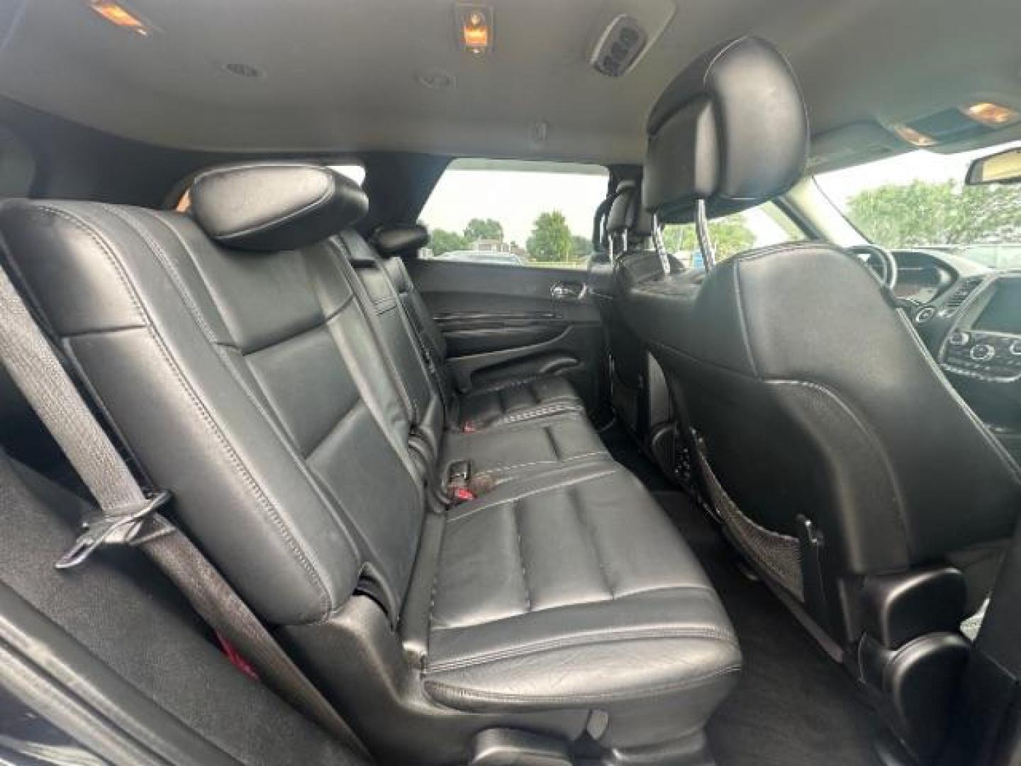 2014 Granite Crystal Met CC Dodge Durango Limited AWD (1C4RDJDG3EC) with an 3.6L V6 DOHC 24V engine, 8-Speed Automatic transmission, located at 1184 Kauffman Ave, Fairborn, OH, 45324, (937) 908-9800, 39.807365, -84.029114 - Third Row - Photo#10