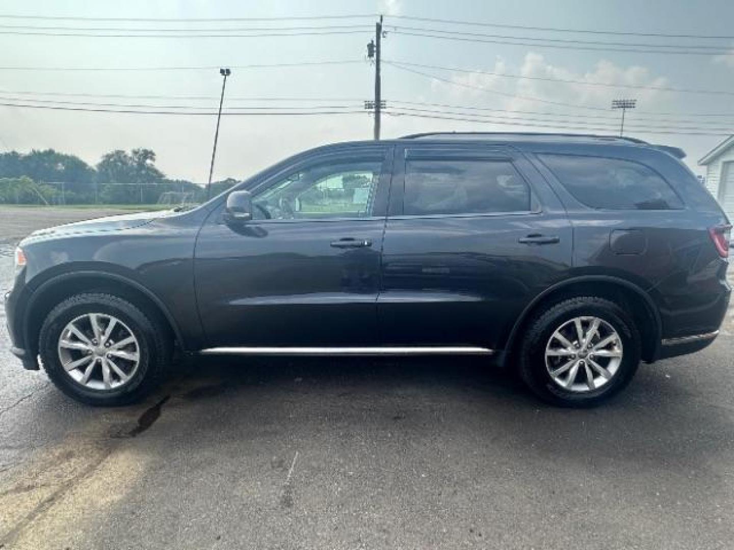 2014 Granite Crystal Met CC Dodge Durango Limited AWD (1C4RDJDG3EC) with an 3.6L V6 DOHC 24V engine, 8-Speed Automatic transmission, located at 1184 Kauffman Ave, Fairborn, OH, 45324, (937) 908-9800, 39.807365, -84.029114 - Third Row - Photo#3