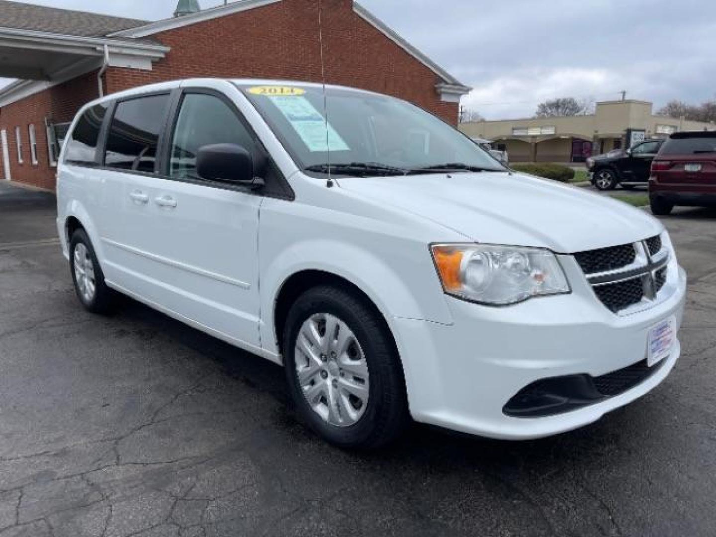 2014 Bright White Clearcoat Dodge Grand Caravan SE (2C4RDGBG9ER) with an 3.6L V6 DOHC 24V engine, 6-Speed Automatic transmission, located at 880 E. National Road, Vandalia, OH, 45377, (937) 908-9800, 39.892189, -84.181015 - Photo#0