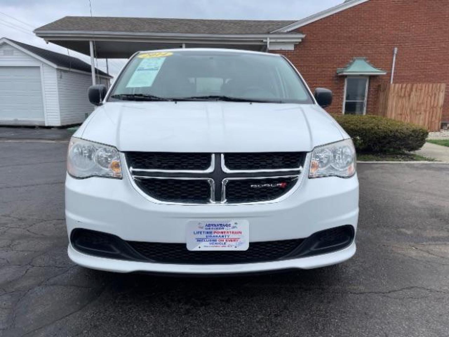 2014 Bright White Clearcoat Dodge Grand Caravan SE (2C4RDGBG9ER) with an 3.6L V6 DOHC 24V engine, 6-Speed Automatic transmission, located at 880 E. National Road, Vandalia, OH, 45377, (937) 908-9800, 39.892189, -84.181015 - Photo#2