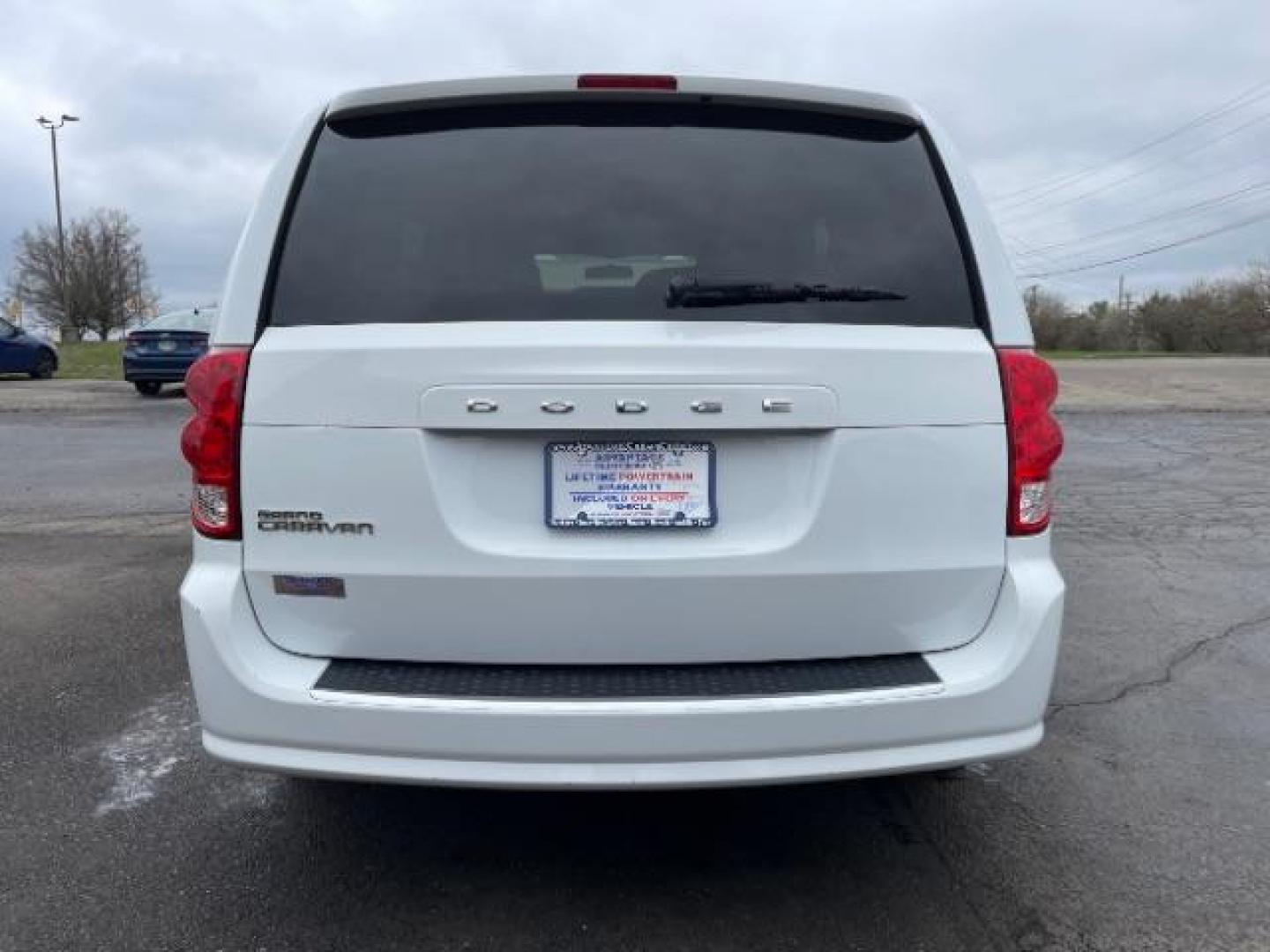 2014 Bright White Clearcoat Dodge Grand Caravan SE (2C4RDGBG9ER) with an 3.6L V6 DOHC 24V engine, 6-Speed Automatic transmission, located at 880 E. National Road, Vandalia, OH, 45377, (937) 908-9800, 39.892189, -84.181015 - Photo#3