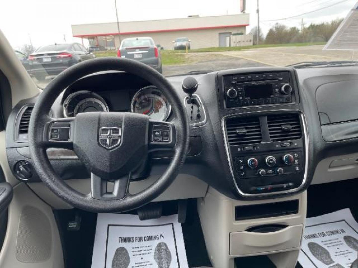 2014 Bright White Clearcoat Dodge Grand Caravan SE (2C4RDGBG9ER) with an 3.6L V6 DOHC 24V engine, 6-Speed Automatic transmission, located at 880 E. National Road, Vandalia, OH, 45377, (937) 908-9800, 39.892189, -84.181015 - Photo#7