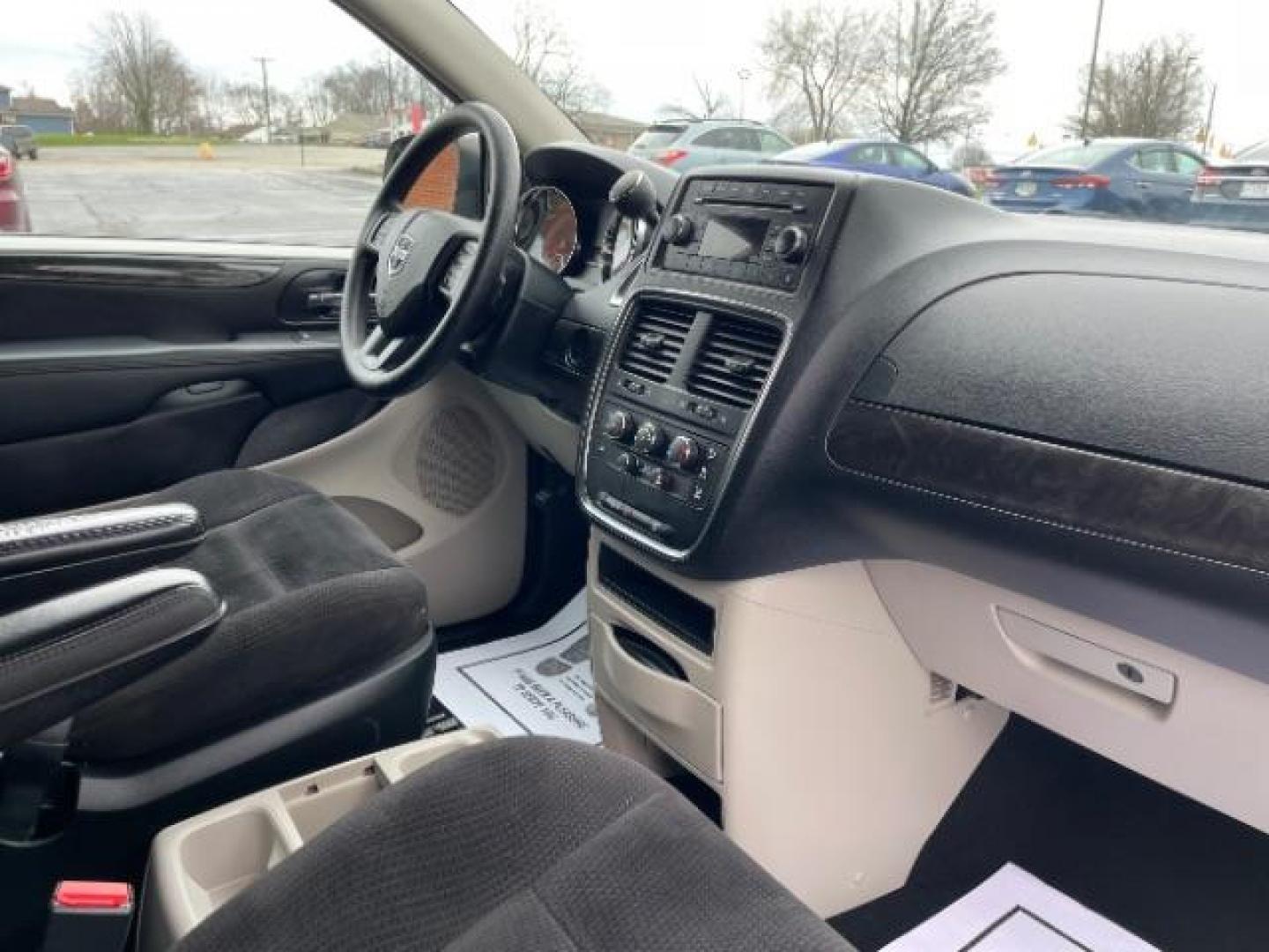 2014 Bright White Clearcoat Dodge Grand Caravan SE (2C4RDGBG9ER) with an 3.6L V6 DOHC 24V engine, 6-Speed Automatic transmission, located at 880 E. National Road, Vandalia, OH, 45377, (937) 908-9800, 39.892189, -84.181015 - Photo#8