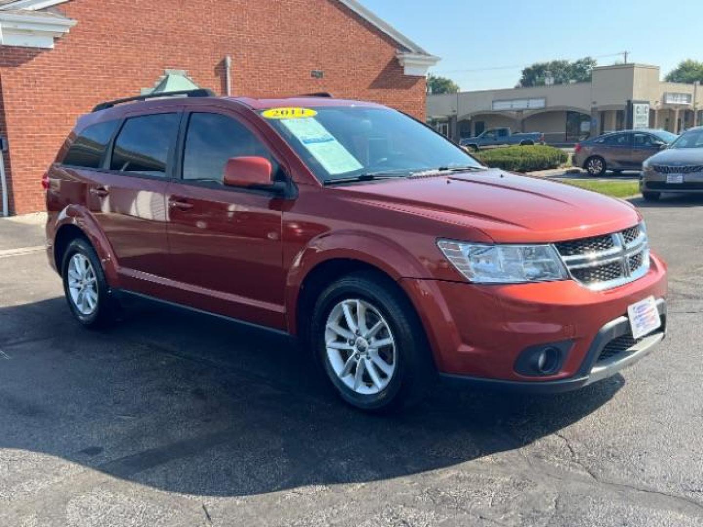 2014 Copperhead Pearlcoat Dodge Journey SXT (3C4PDCBB5ET) with an 2.4L L6 DOHC 16V engine, 4-Speed Automatic transmission, located at 1184 Kauffman Ave, Fairborn, OH, 45324, (937) 908-9800, 39.807365, -84.029114 - Photo#0