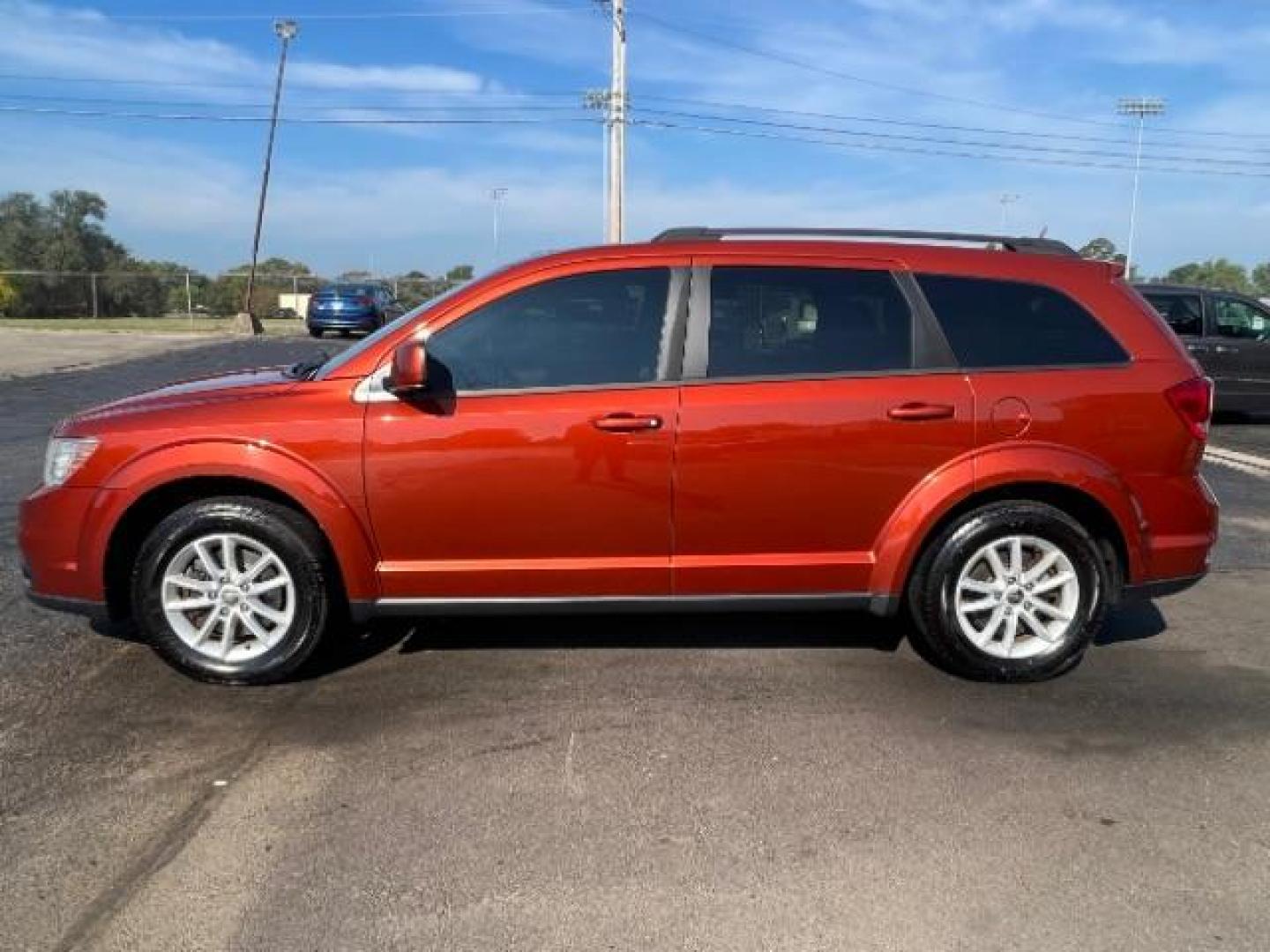 2014 Copperhead Pearlcoat Dodge Journey SXT (3C4PDCBB5ET) with an 2.4L L6 DOHC 16V engine, 4-Speed Automatic transmission, located at 1184 Kauffman Ave, Fairborn, OH, 45324, (937) 908-9800, 39.807365, -84.029114 - Photo#3