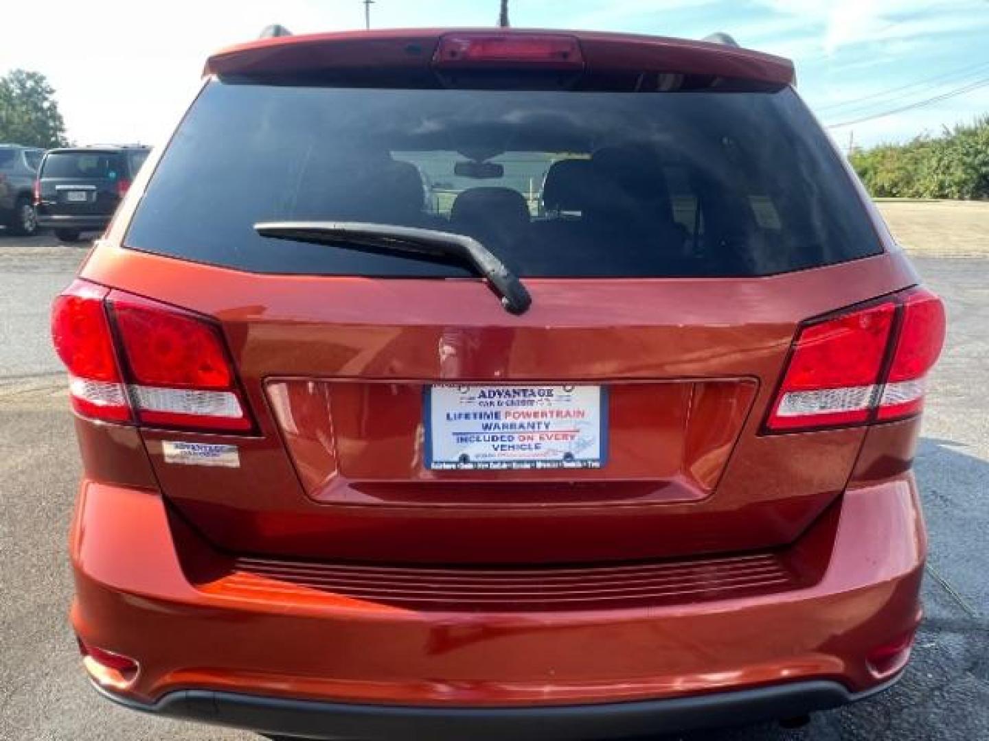 2014 Copperhead Pearlcoat Dodge Journey SXT (3C4PDCBB5ET) with an 2.4L L6 DOHC 16V engine, 4-Speed Automatic transmission, located at 1184 Kauffman Ave, Fairborn, OH, 45324, (937) 908-9800, 39.807365, -84.029114 - Photo#4