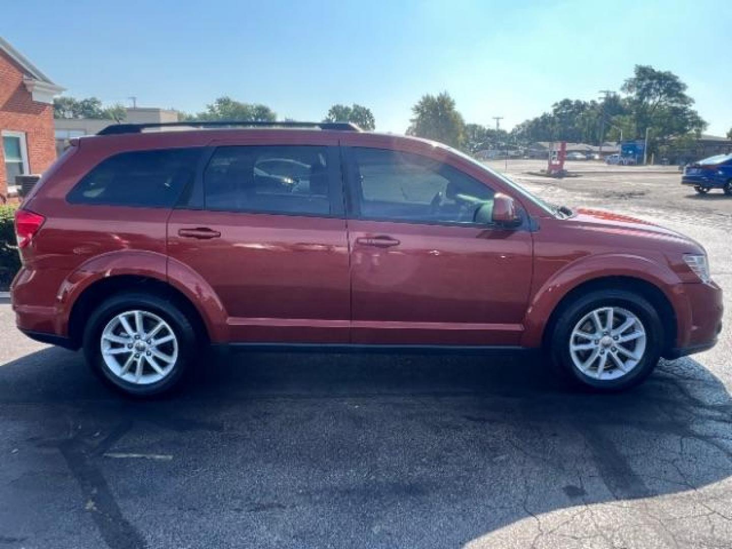 2014 Copperhead Pearlcoat Dodge Journey SXT (3C4PDCBB5ET) with an 2.4L L6 DOHC 16V engine, 4-Speed Automatic transmission, located at 1184 Kauffman Ave, Fairborn, OH, 45324, (937) 908-9800, 39.807365, -84.029114 - Photo#5