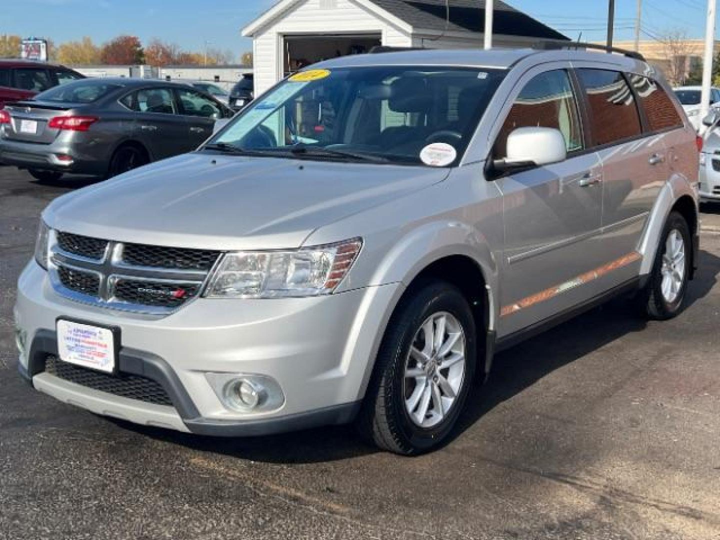 2014 Bright Silver Metallic CC Dodge Journey SXT (3C4PDCBG5ET) with an 3.6L V6 DOHC 24V engine, 6-Speed Automatic transmission, located at 401 Woodman Dr, Riverside, OH, 45431, (937) 908-9800, 39.763779, -84.122063 - Photo#2