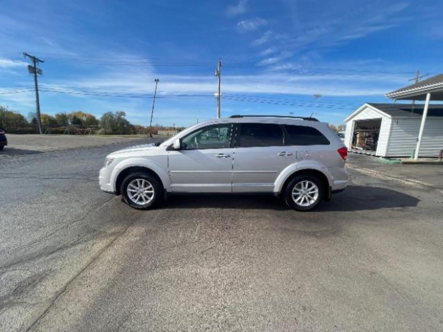 2014 Bright Silver Metallic CC Dodge Journey SXT (3C4PDCBG5ET) with an 3.6L V6 DOHC 24V engine, 6-Speed Automatic transmission, located at 401 Woodman Dr, Riverside, OH, 45431, (937) 908-9800, 39.763779, -84.122063 - Photo#3